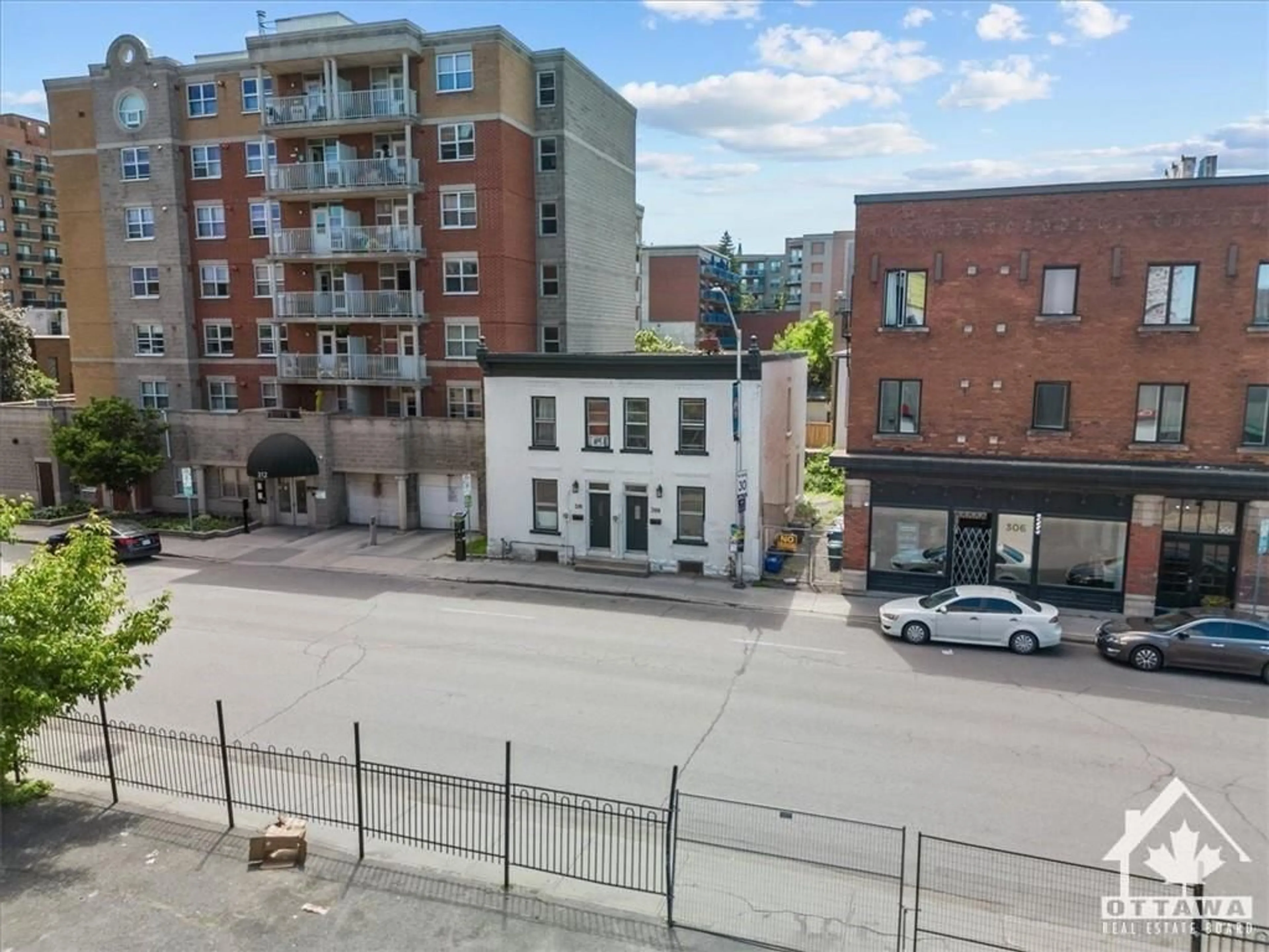 A pic from exterior of the house or condo, the street view for 308-310 CUMBERLAND St, Ottawa Ontario K1N 7H9