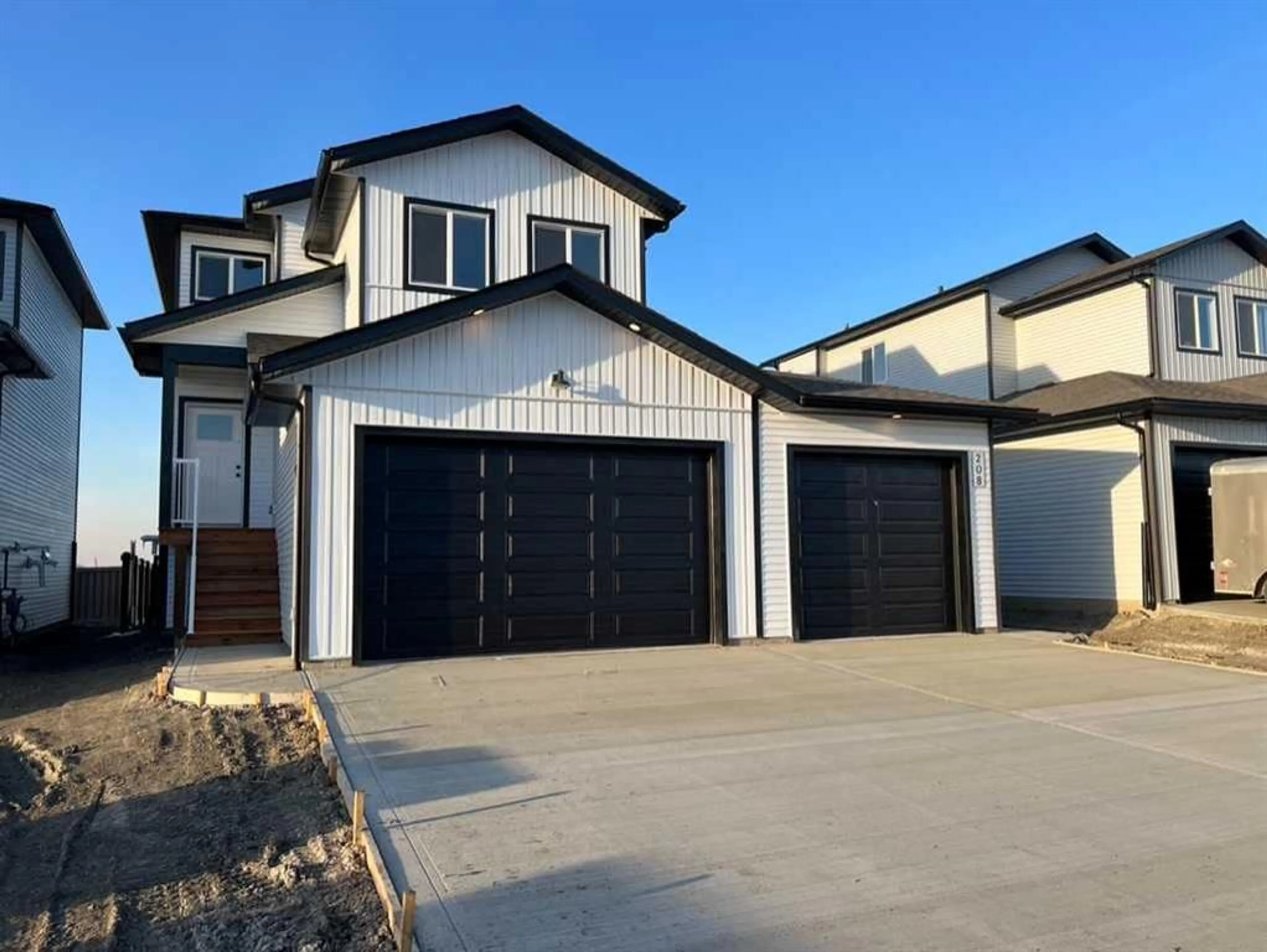 Frontside or backside of a home for 11850 84 Ave #208, Grande Prairie Alberta T8W 0M4