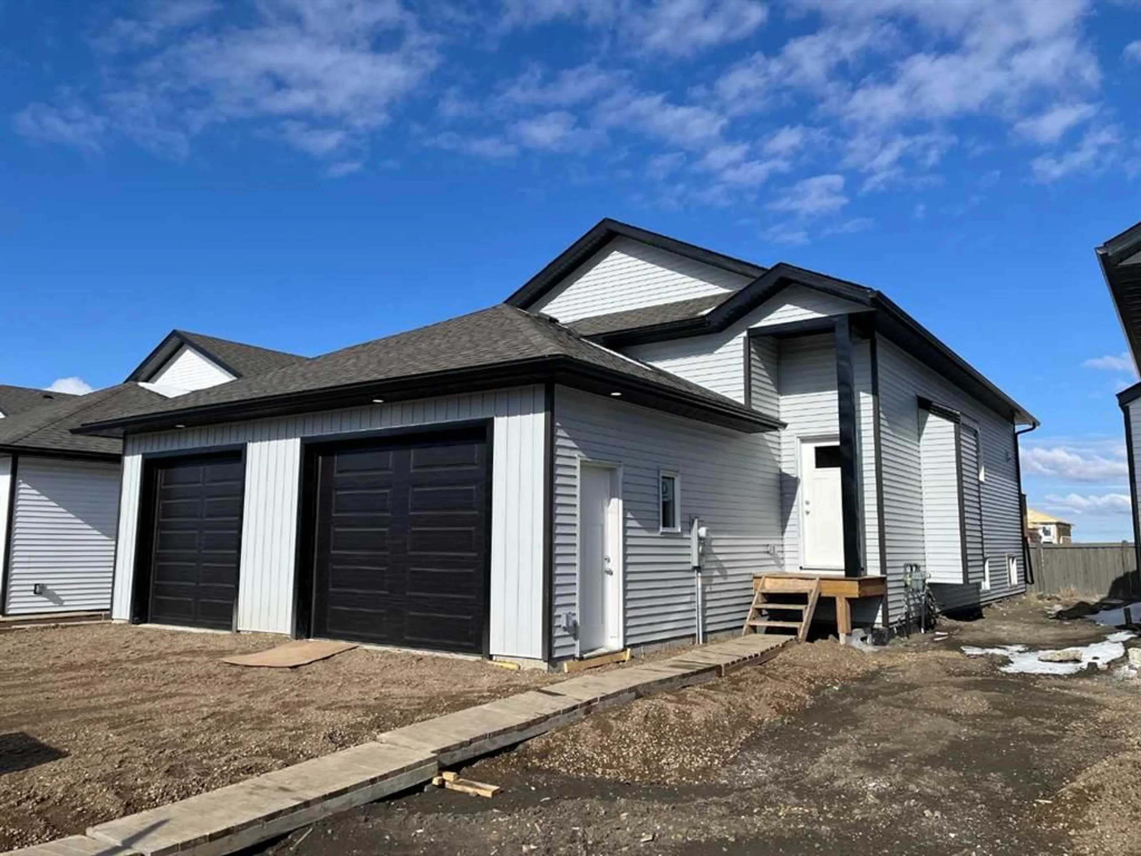 Frontside or backside of a home for 11850 84 Ave #214, Grande Prairie Alberta T8W 0M4