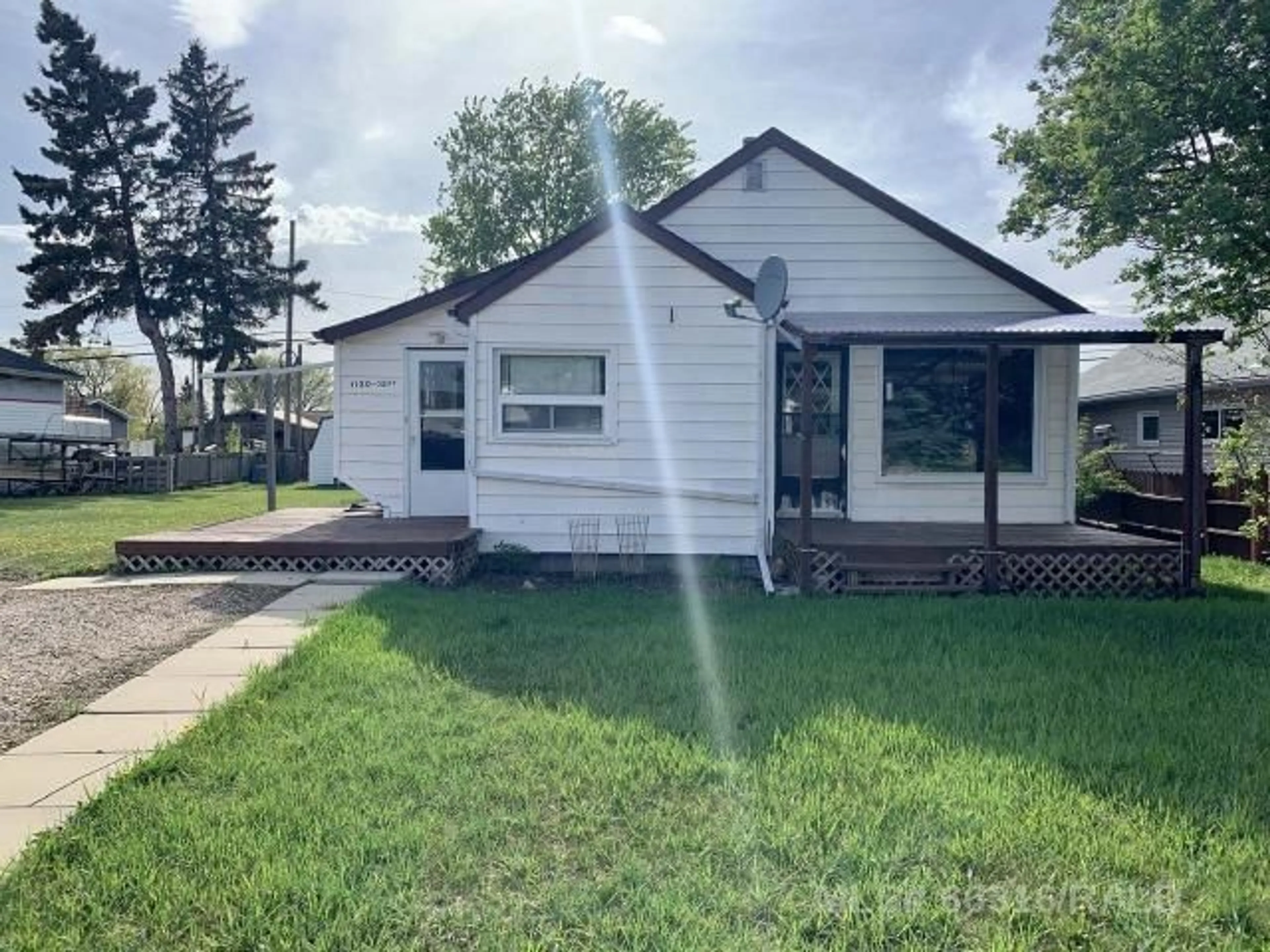 Frontside or backside of a home for 1130 15 St, Wainwright Alberta T9W 1E4