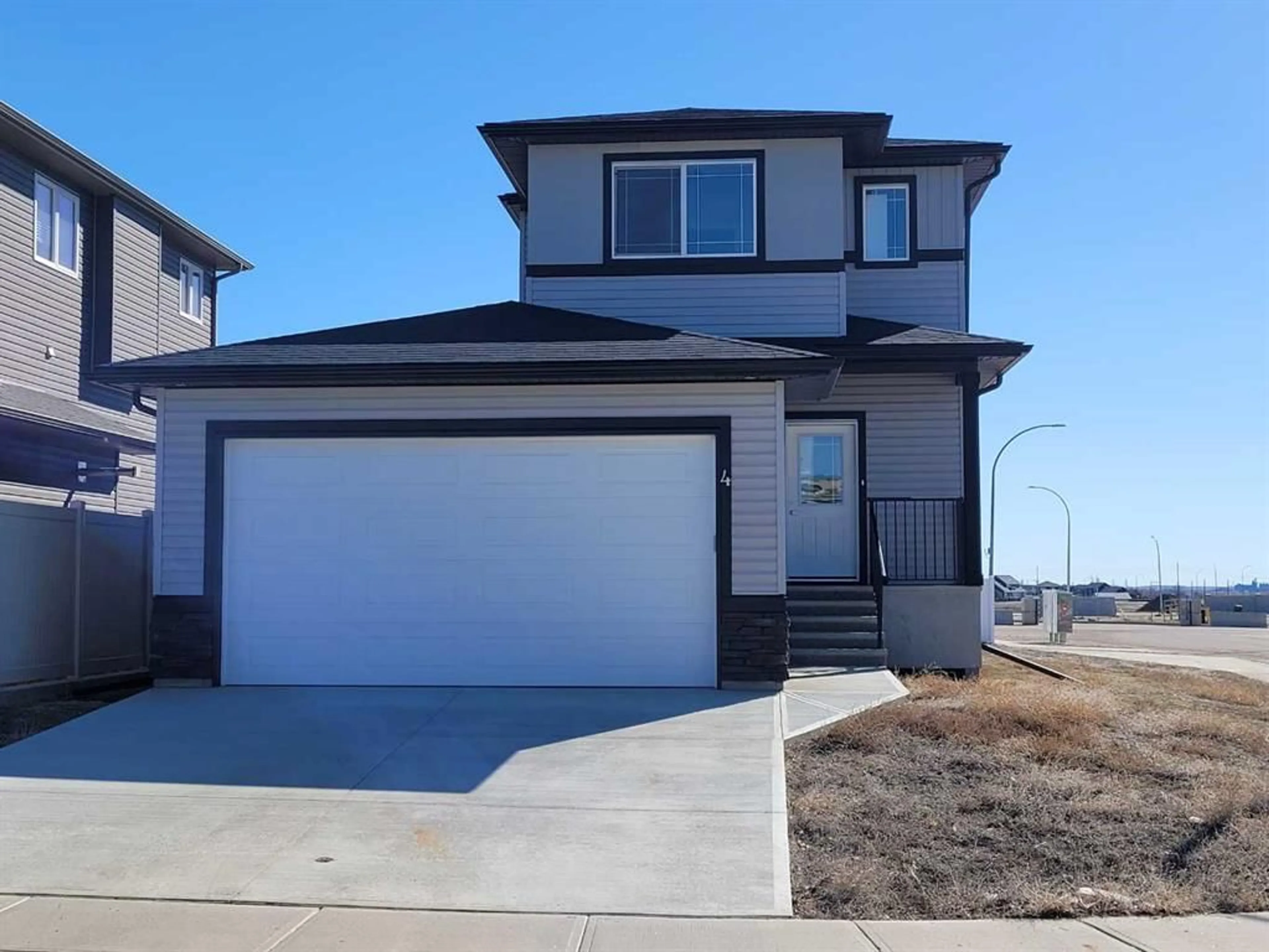 Frontside or backside of a home for 4 Hamptons Cres, Medicine Hat Alberta T1B0N7