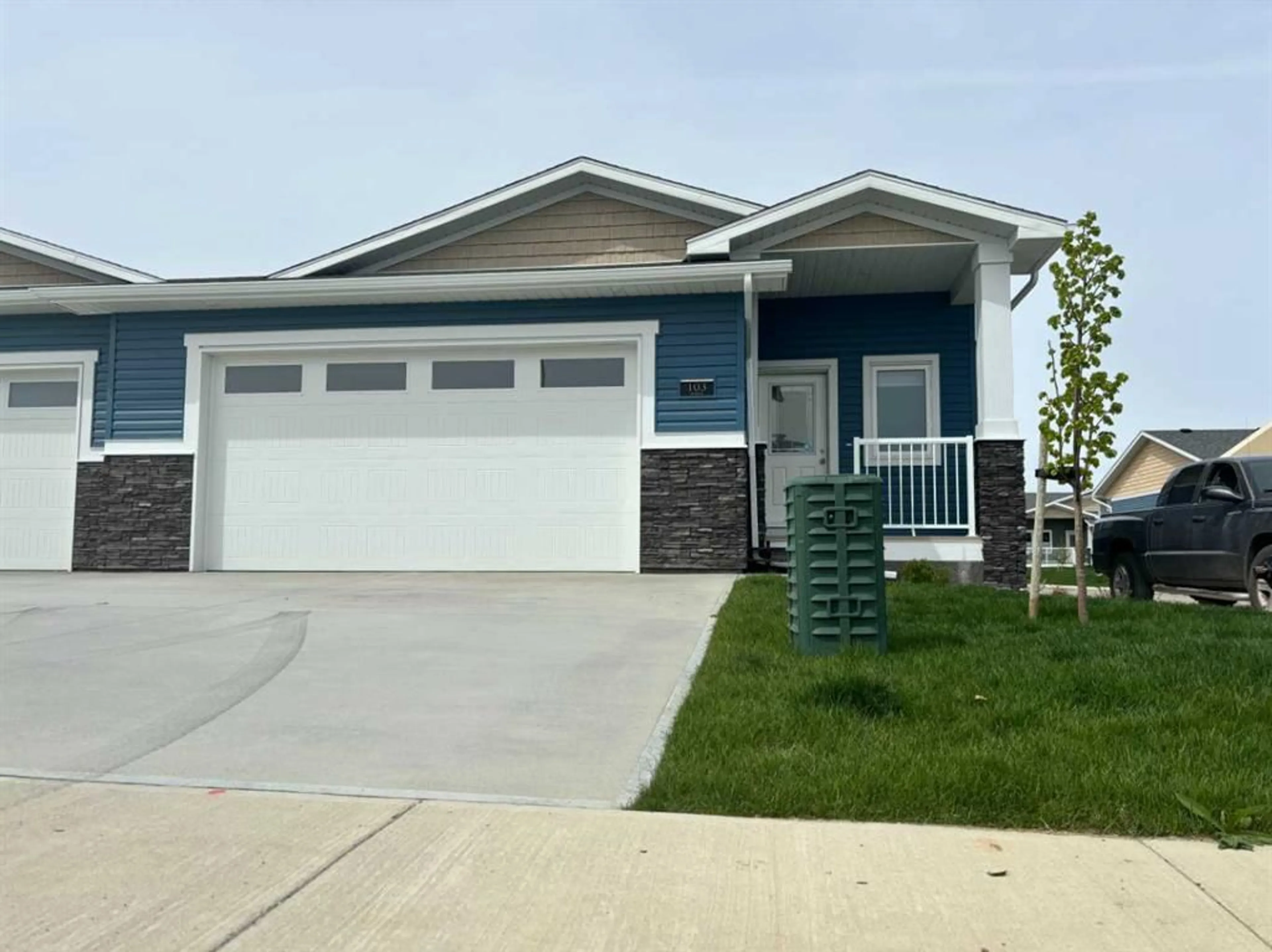 Home with vinyl exterior material for 1940 Parkside Way #103, Coaldale Alberta T1M1M6