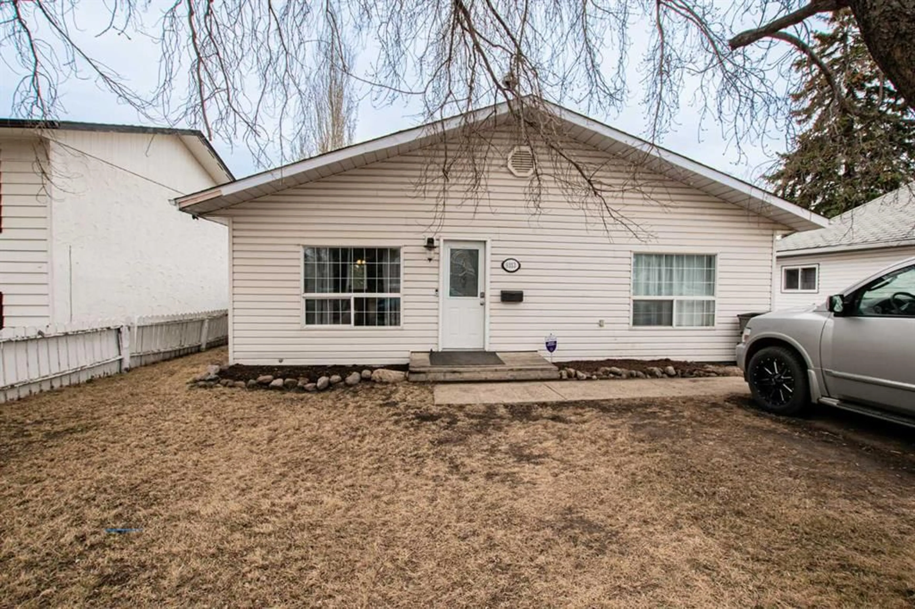 Frontside or backside of a home for 9313 101 Ave, Grande Prairie Alberta T8V 0W5