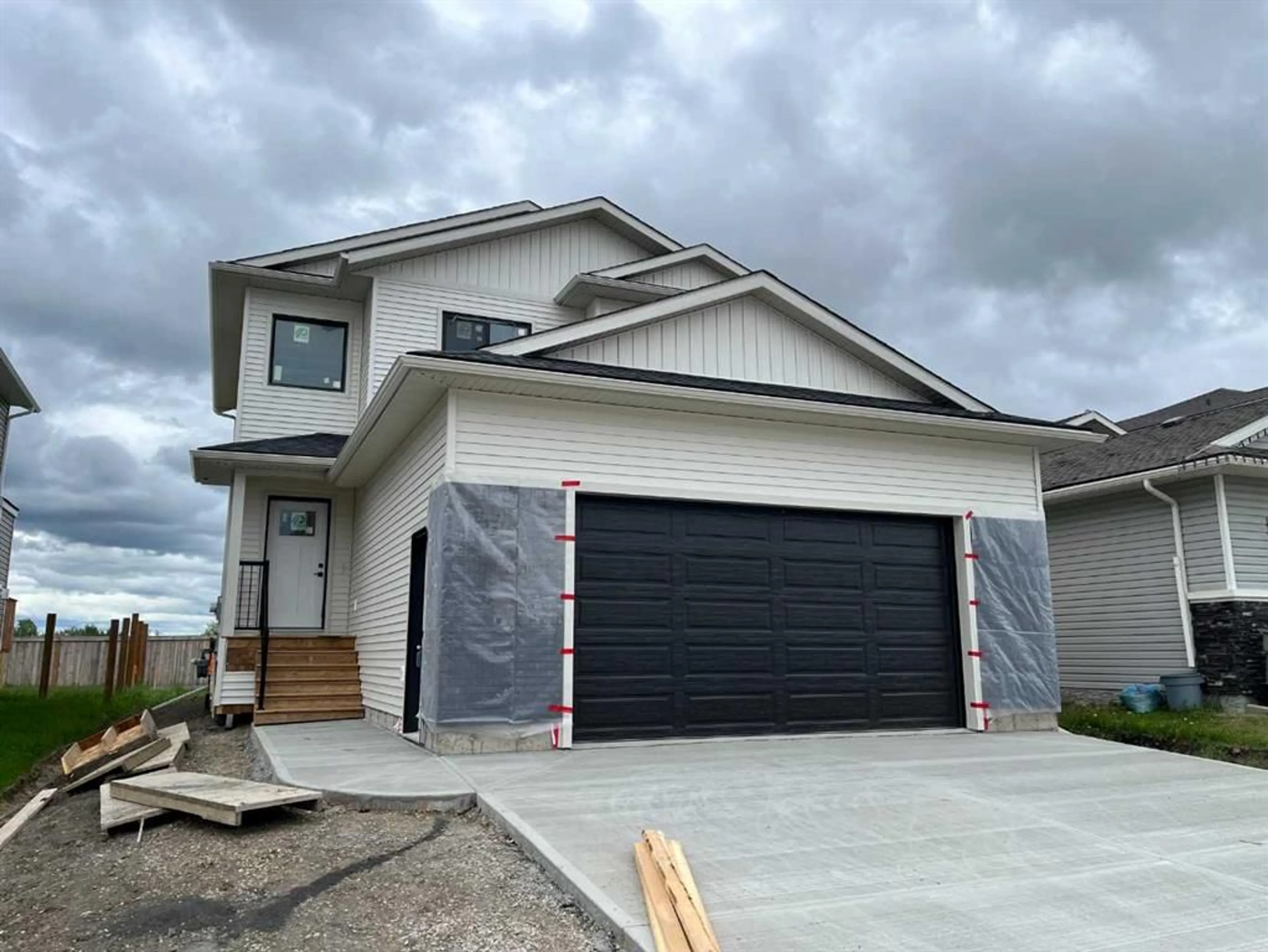 Frontside or backside of a home for 8701 122 Ave, Grande Prairie Alberta T8X 0P7