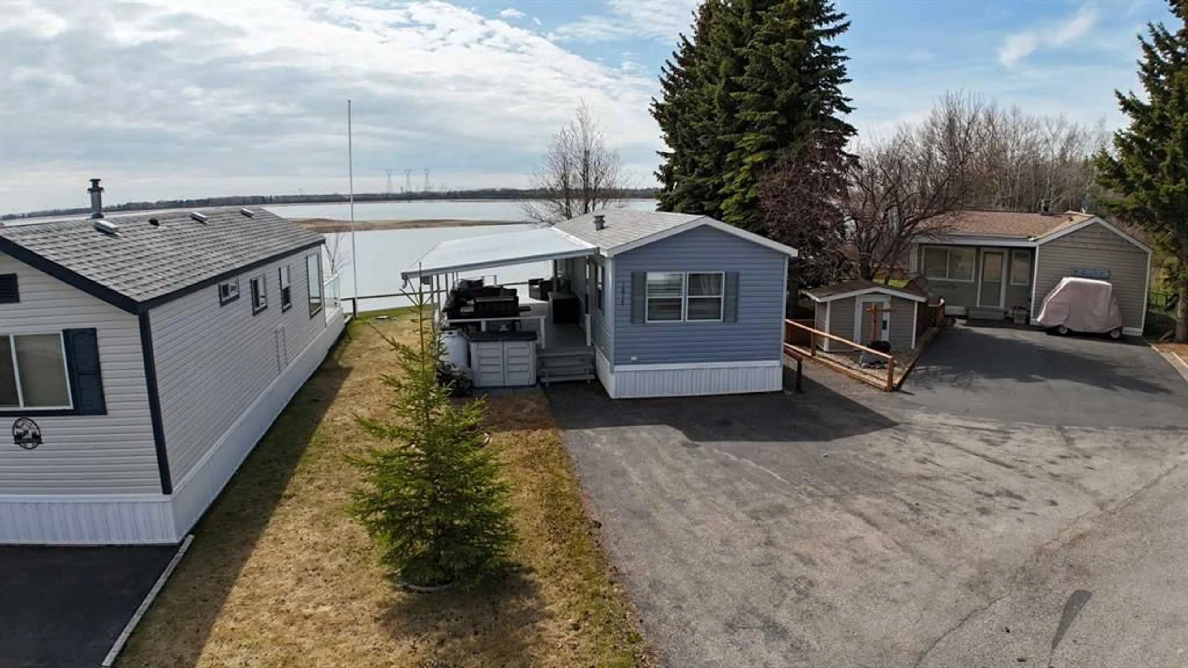 A pic from exterior of the house or condo for 35468 Range Road 30 #1017, Rural Red Deer County Alberta T4R 2R3