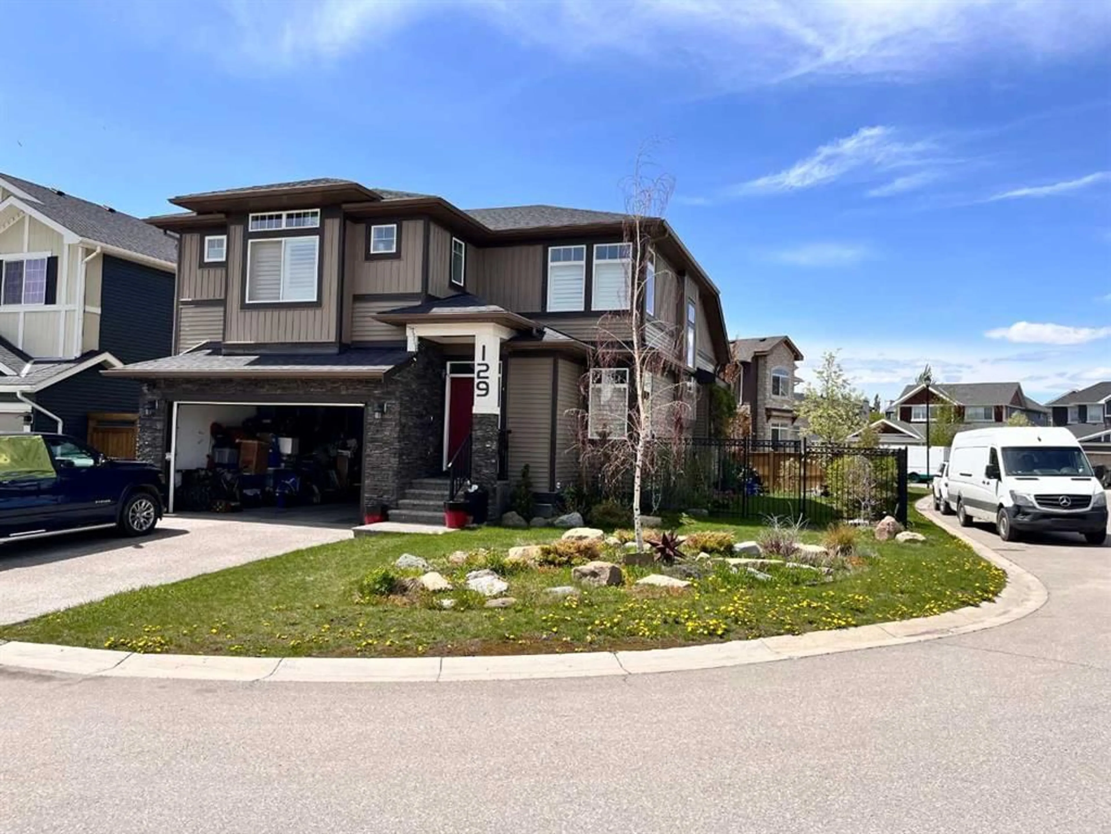 Frontside or backside of a home for 129 Kinniburgh Gdns, Chestermere Alberta T1X0R7