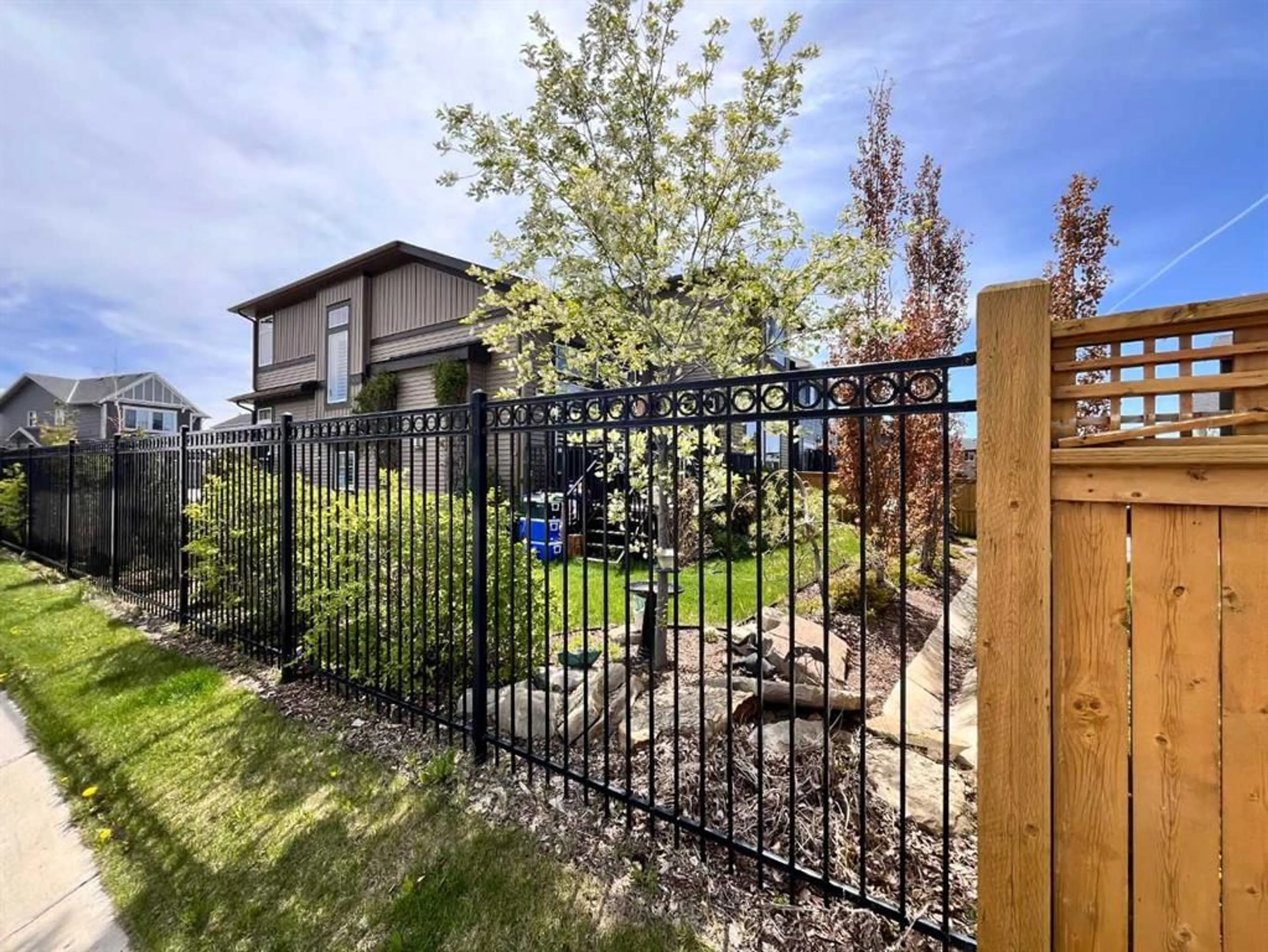 Fenced yard for 129 Kinniburgh Gdns, Chestermere Alberta T1X0R7