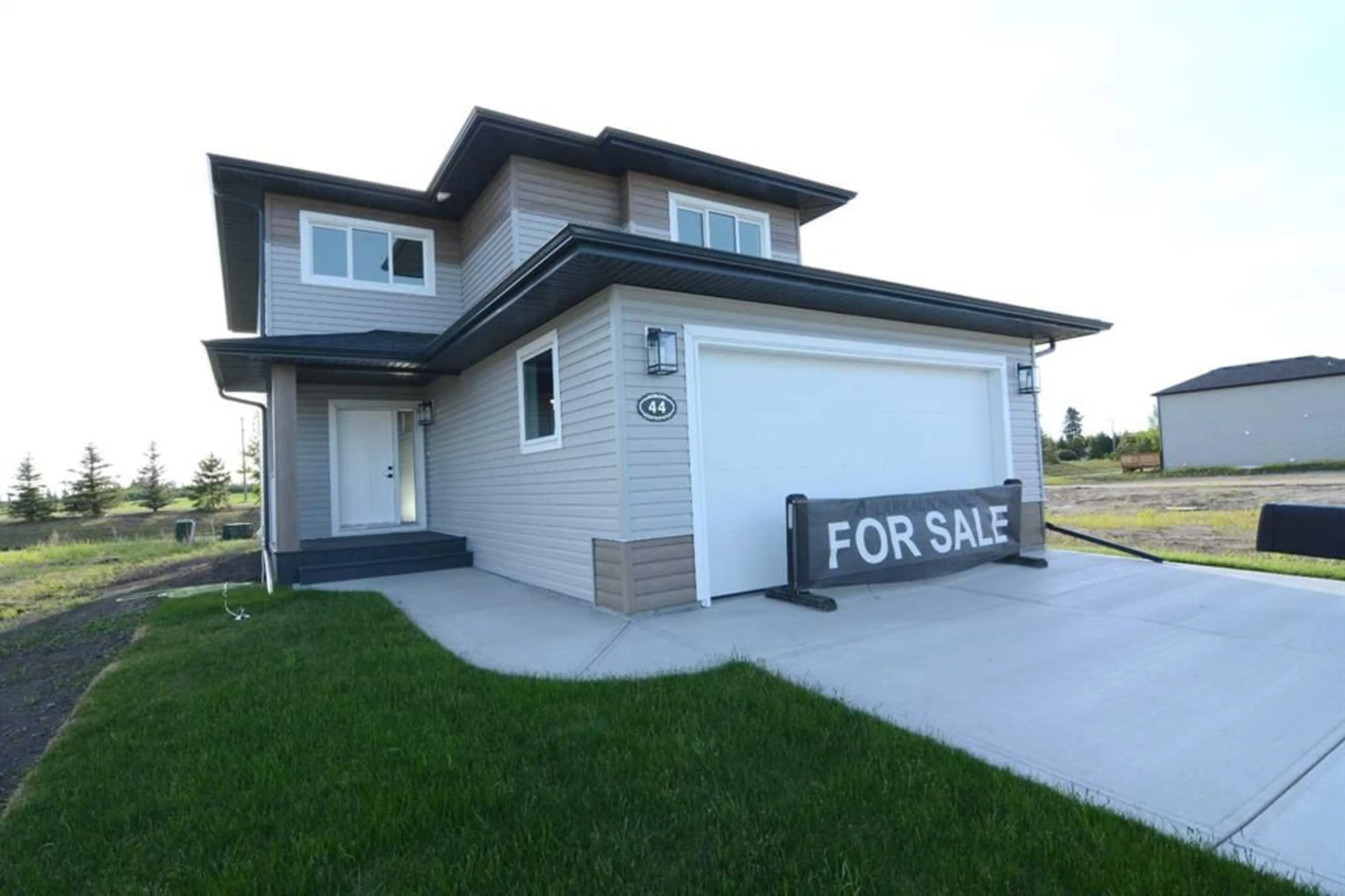 Frontside or backside of a home for 44 Emmett Cres, Red Deer Alberta T4P 3G8
