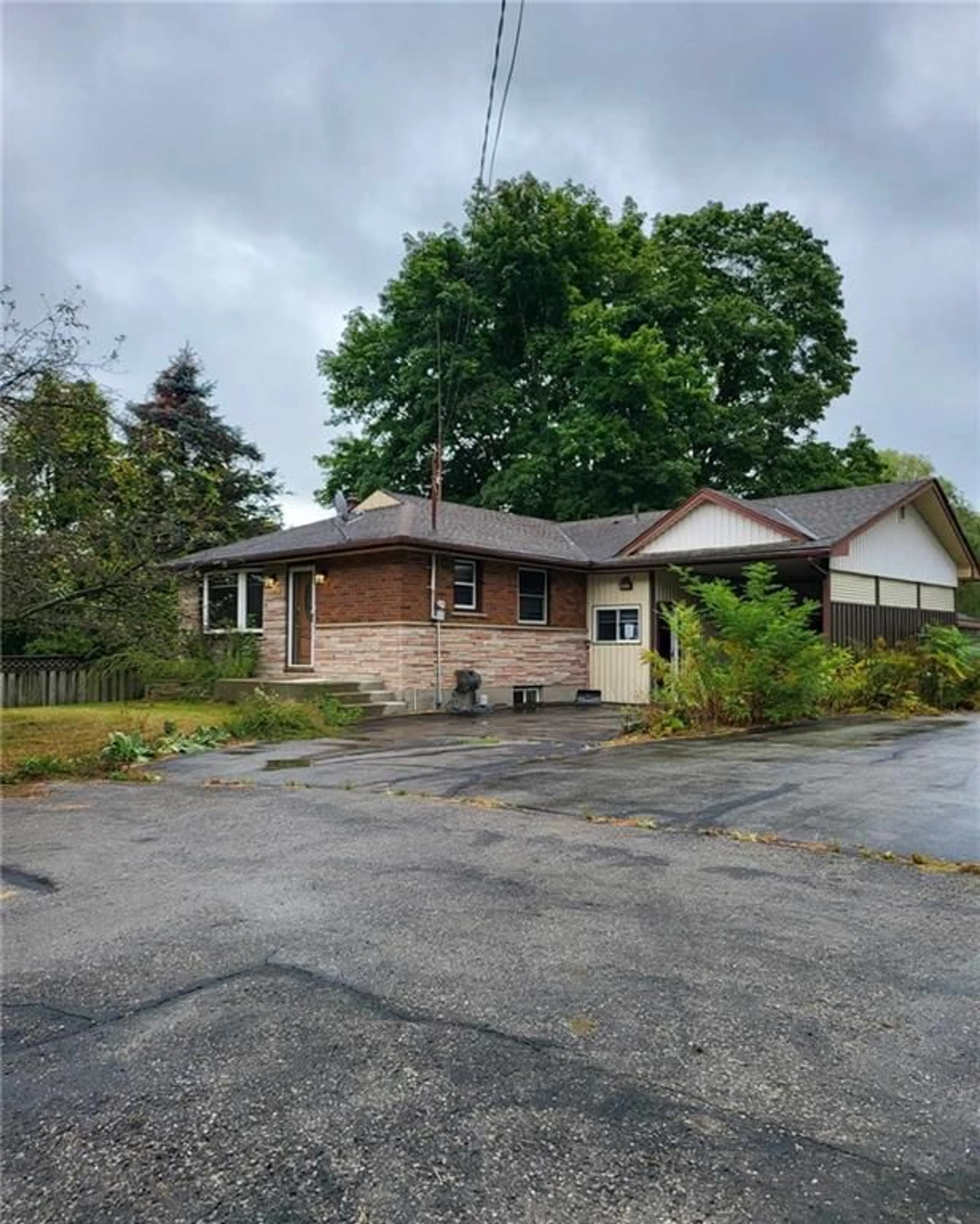 Frontside or backside of a home for 11 53 Hwy, Burford Ontario N0E 1A0