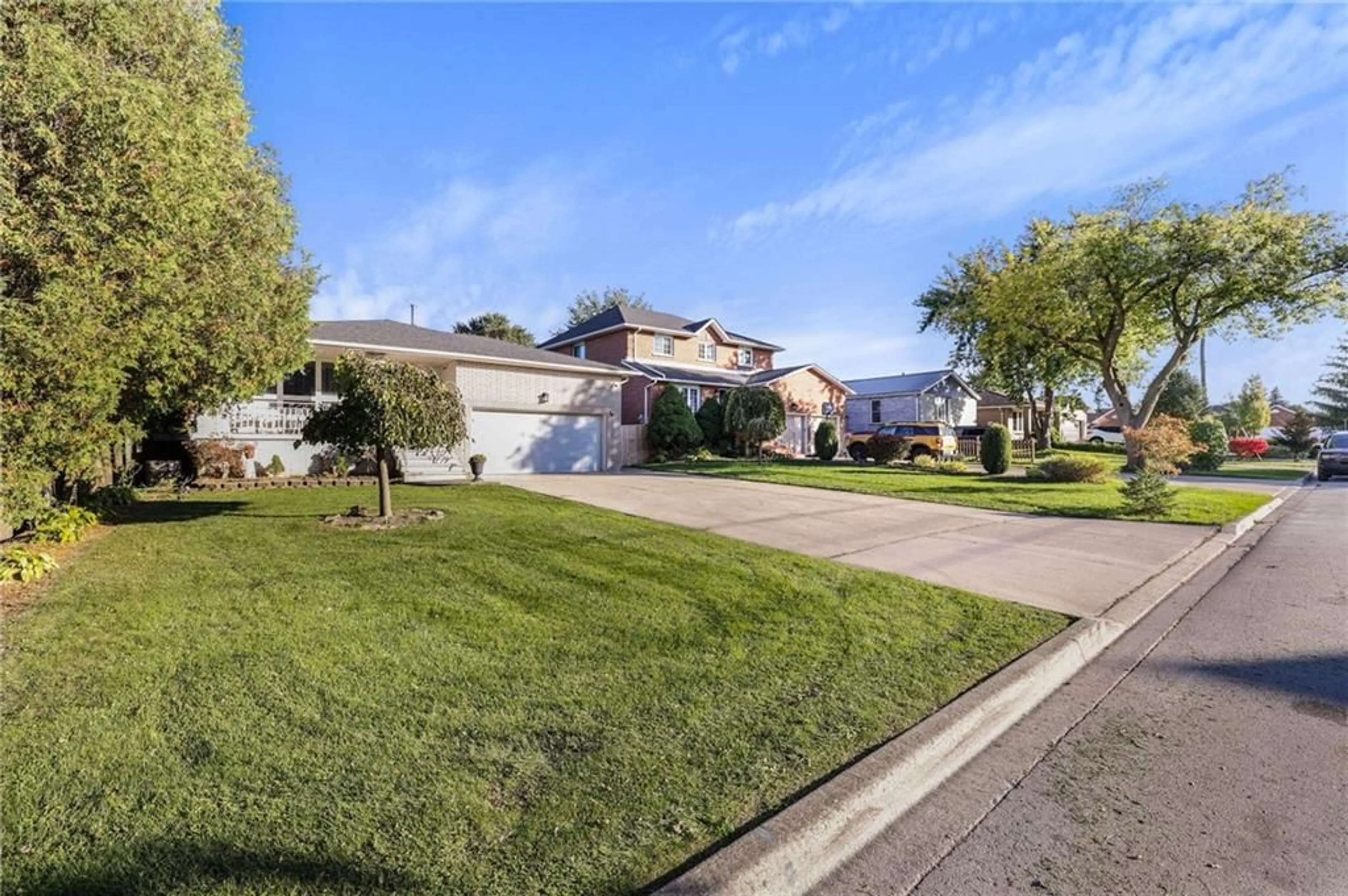 Frontside or backside of a home, the street view for 68 FIRST Rd, Stoney Creek Ontario L8J 2S9