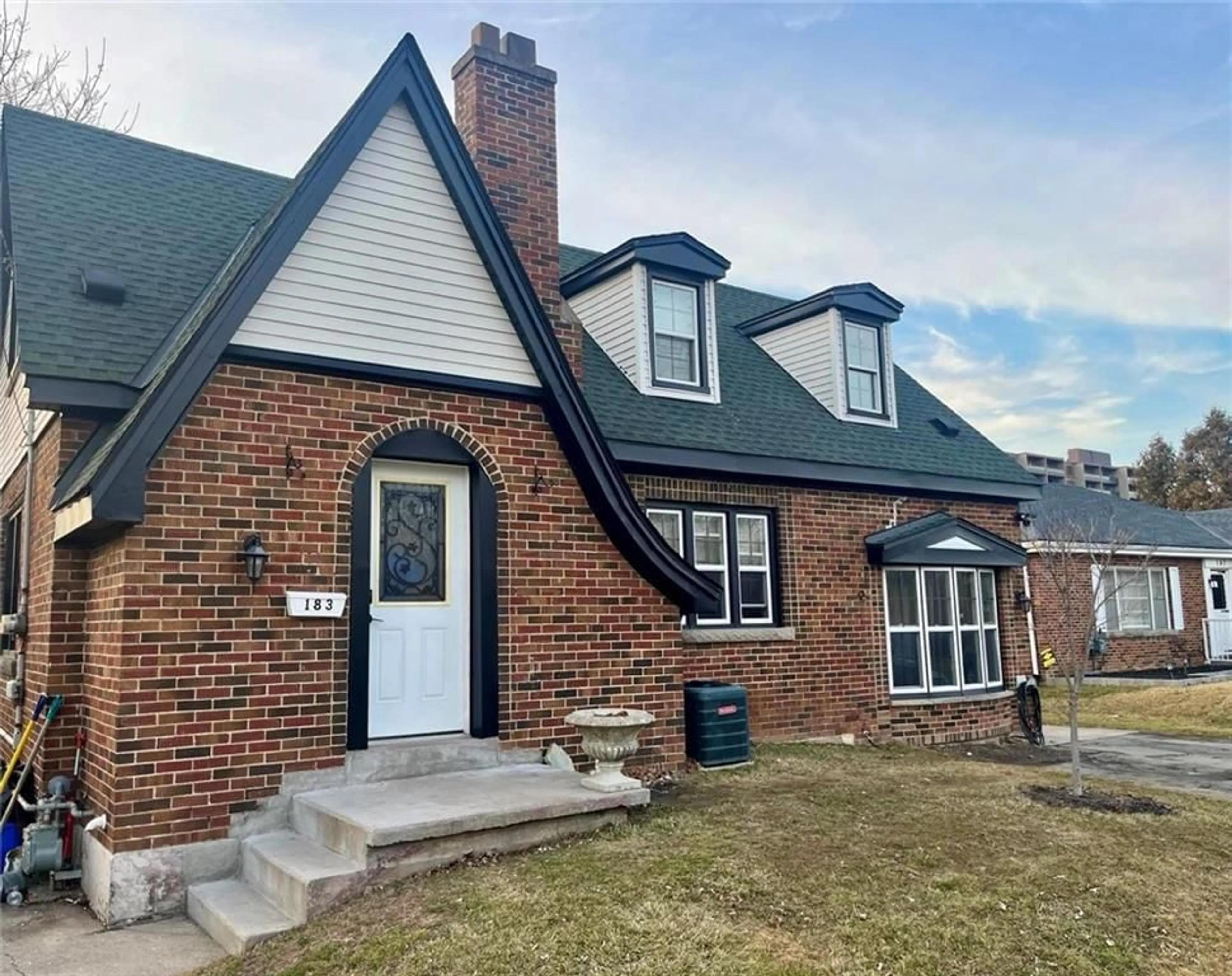 Home with brick exterior material for 183 Lake Ave, Hamilton Ontario L8E 1L5