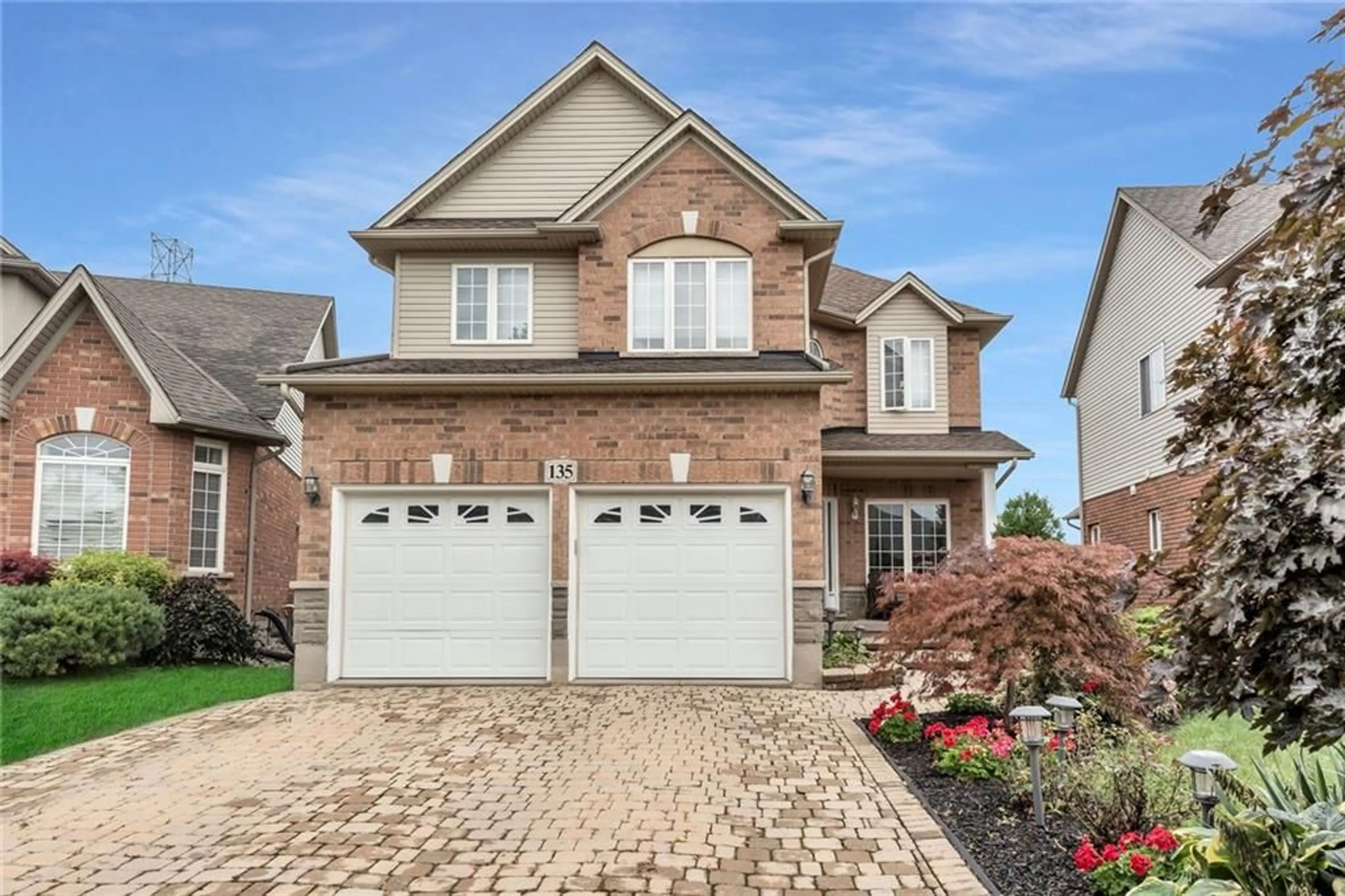 Home with brick exterior material for 135 GARTH TRAILS Cres, Hamilton Ontario L9B 2X2