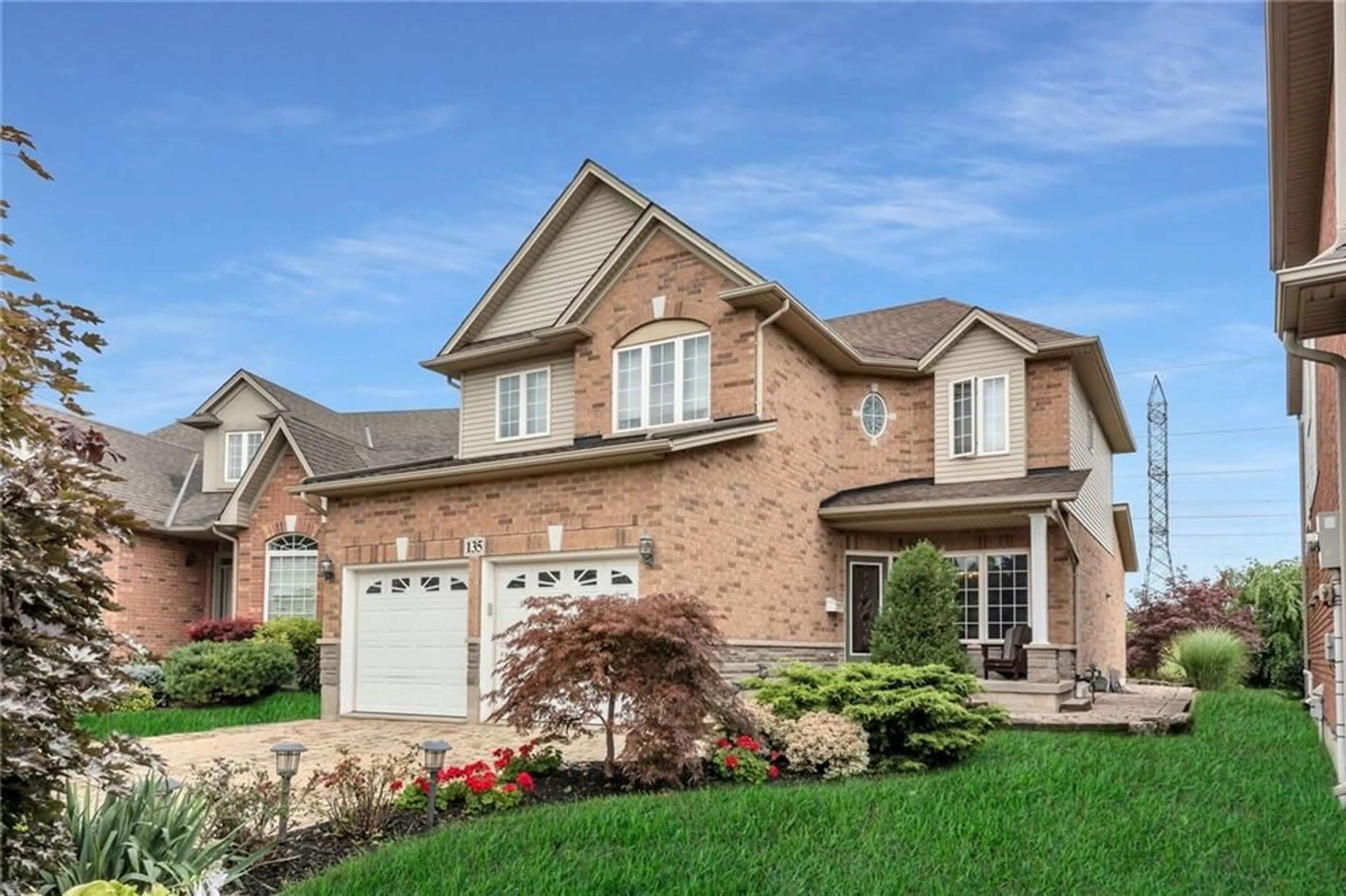 Home with brick exterior material for 135 GARTH TRAILS Cres, Hamilton Ontario L9B 2X2