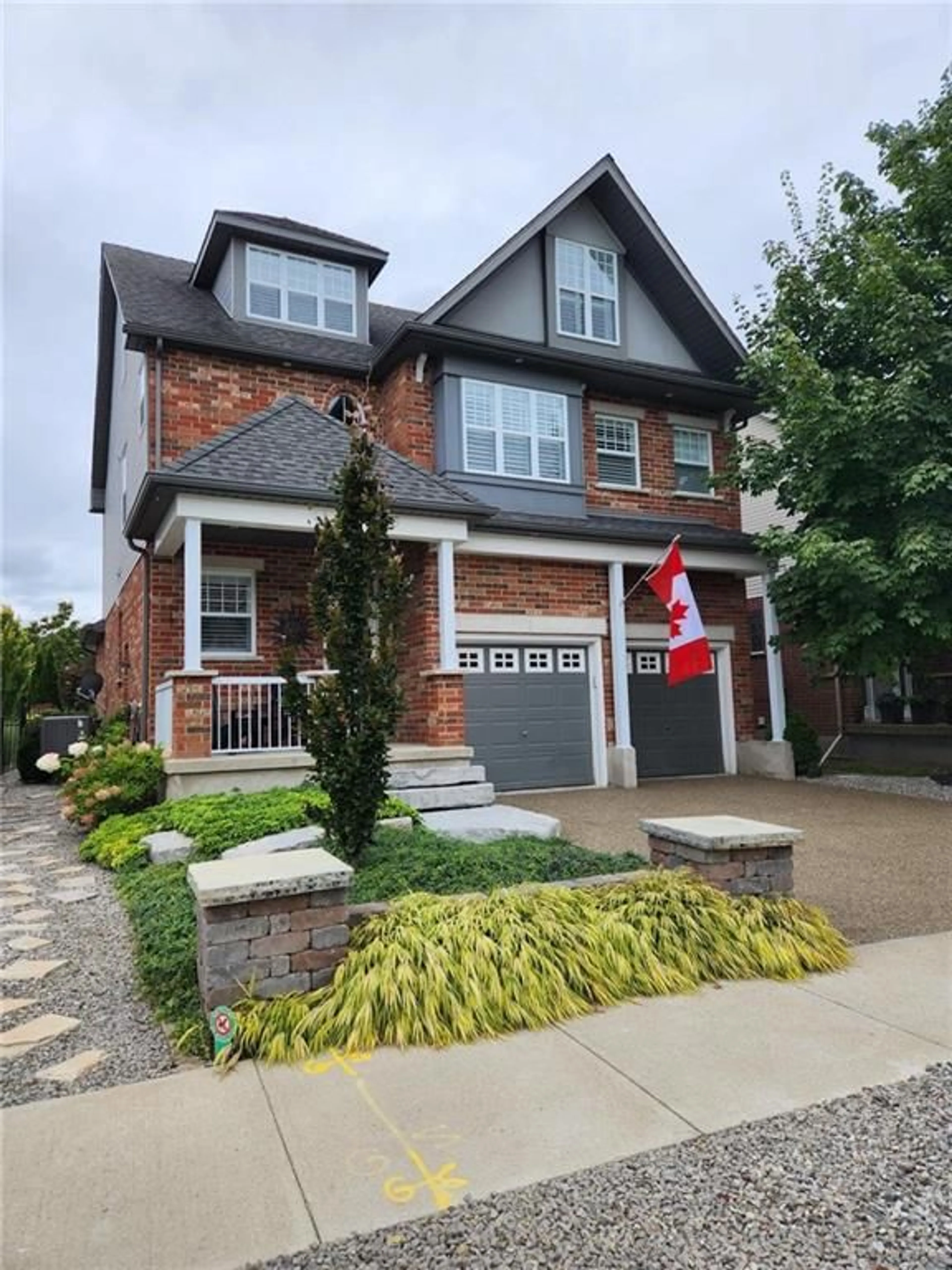 Home with brick exterior material for 76 TREMAINE Dr, Kitchener Ontario N2A 4L7