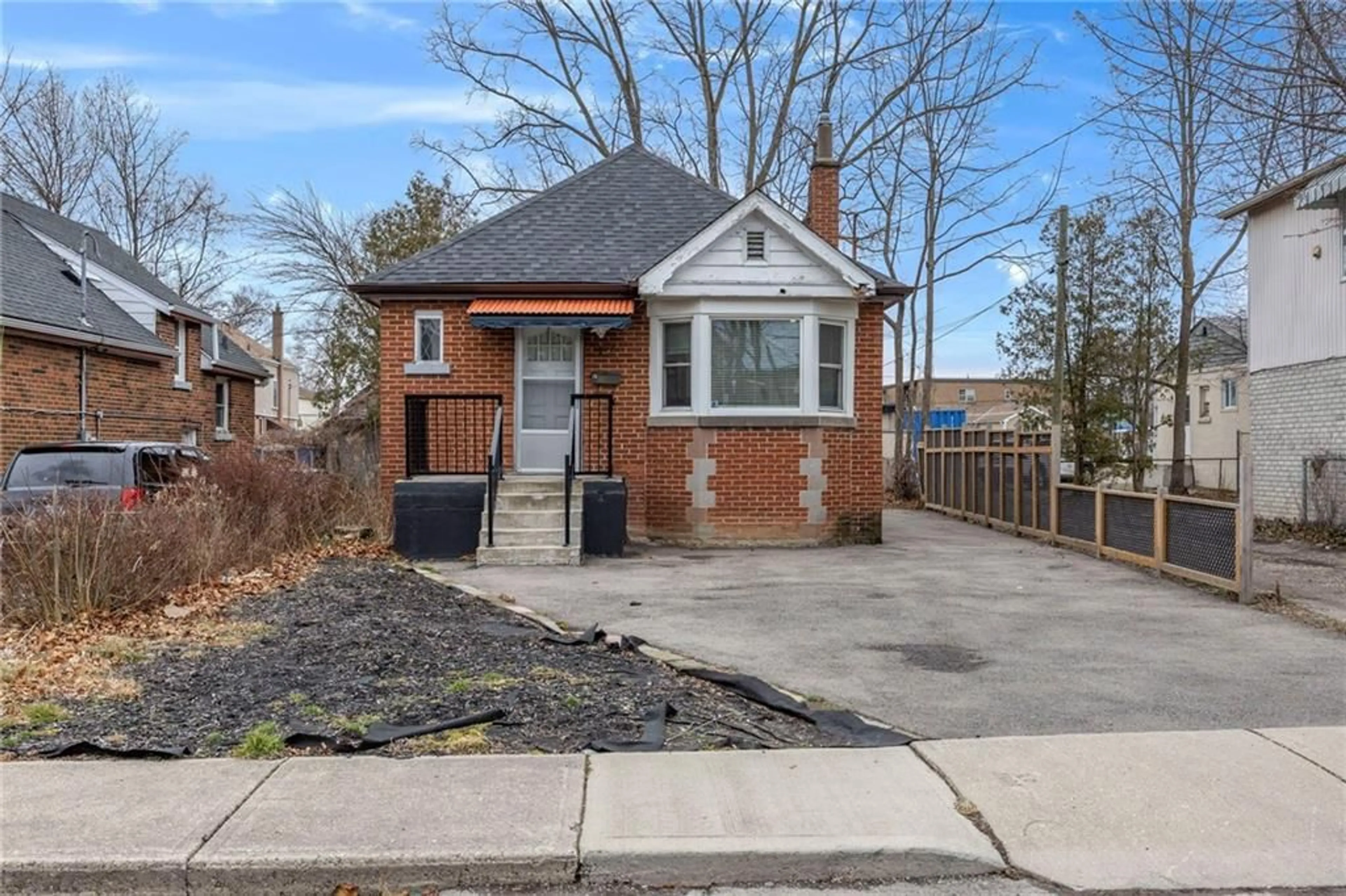 Frontside or backside of a home for 12 Hollywood St, Hamilton Ontario L8S 3B1