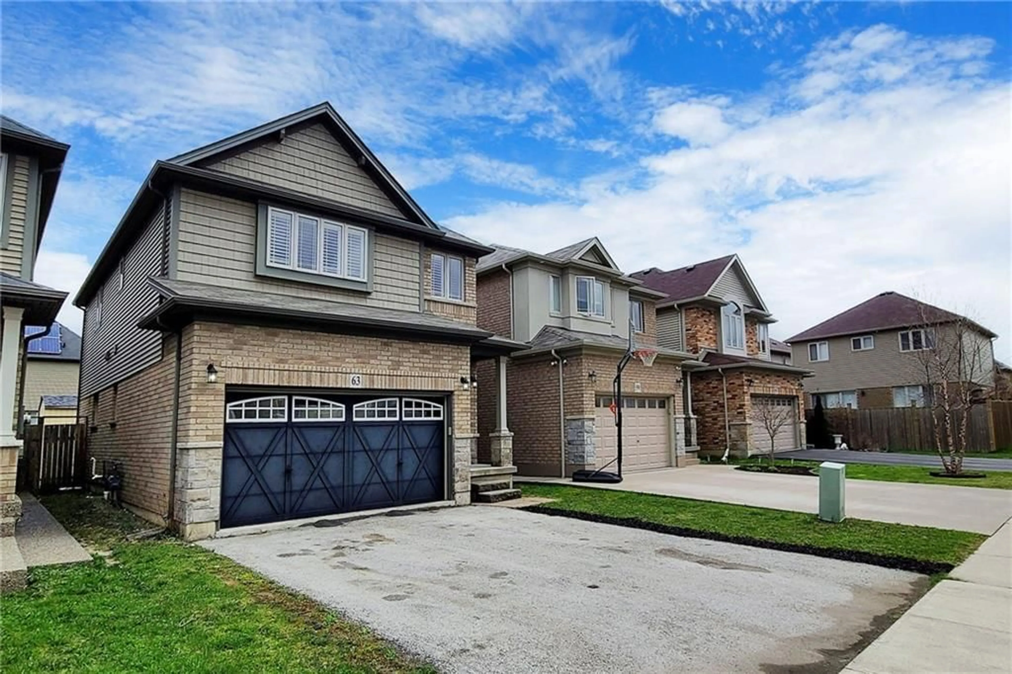 Frontside or backside of a home for 63 CHAMOMILE Dr, Hamilton Ontario L8W 0C1