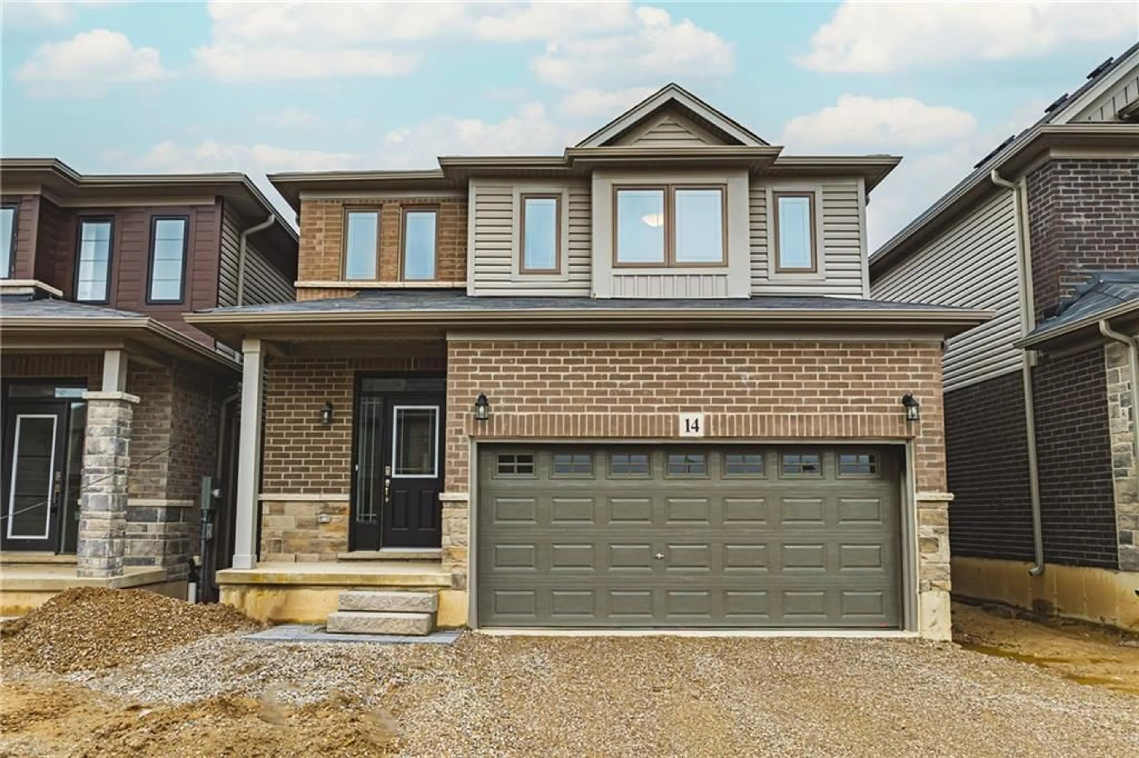 Home with brick exterior material for 14 Broddy Ave, Brantford Ontario N3T 0P3