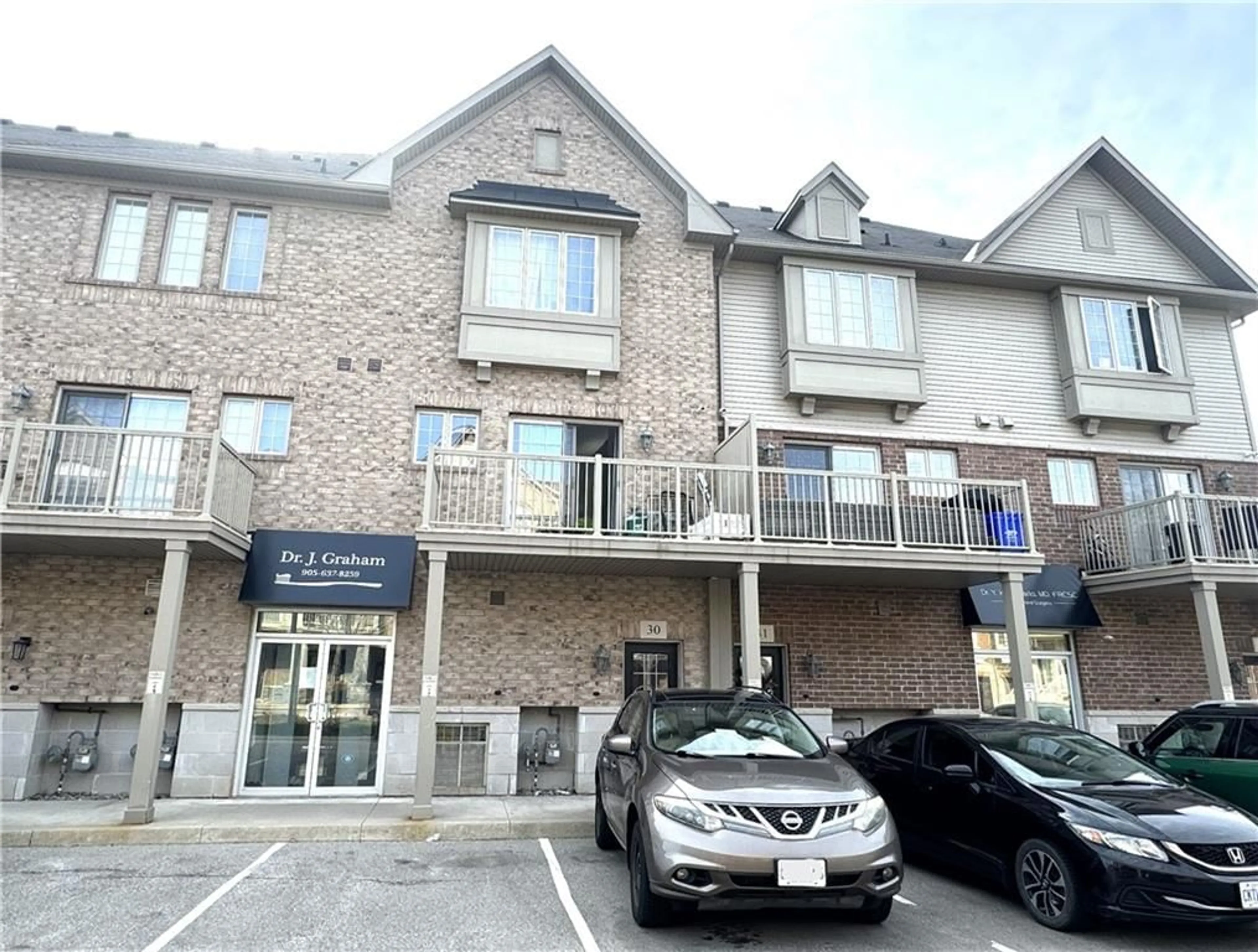 A pic from exterior of the house or condo for 1401 PLAINS Rd #30, Burlington Ontario L7R 0C2