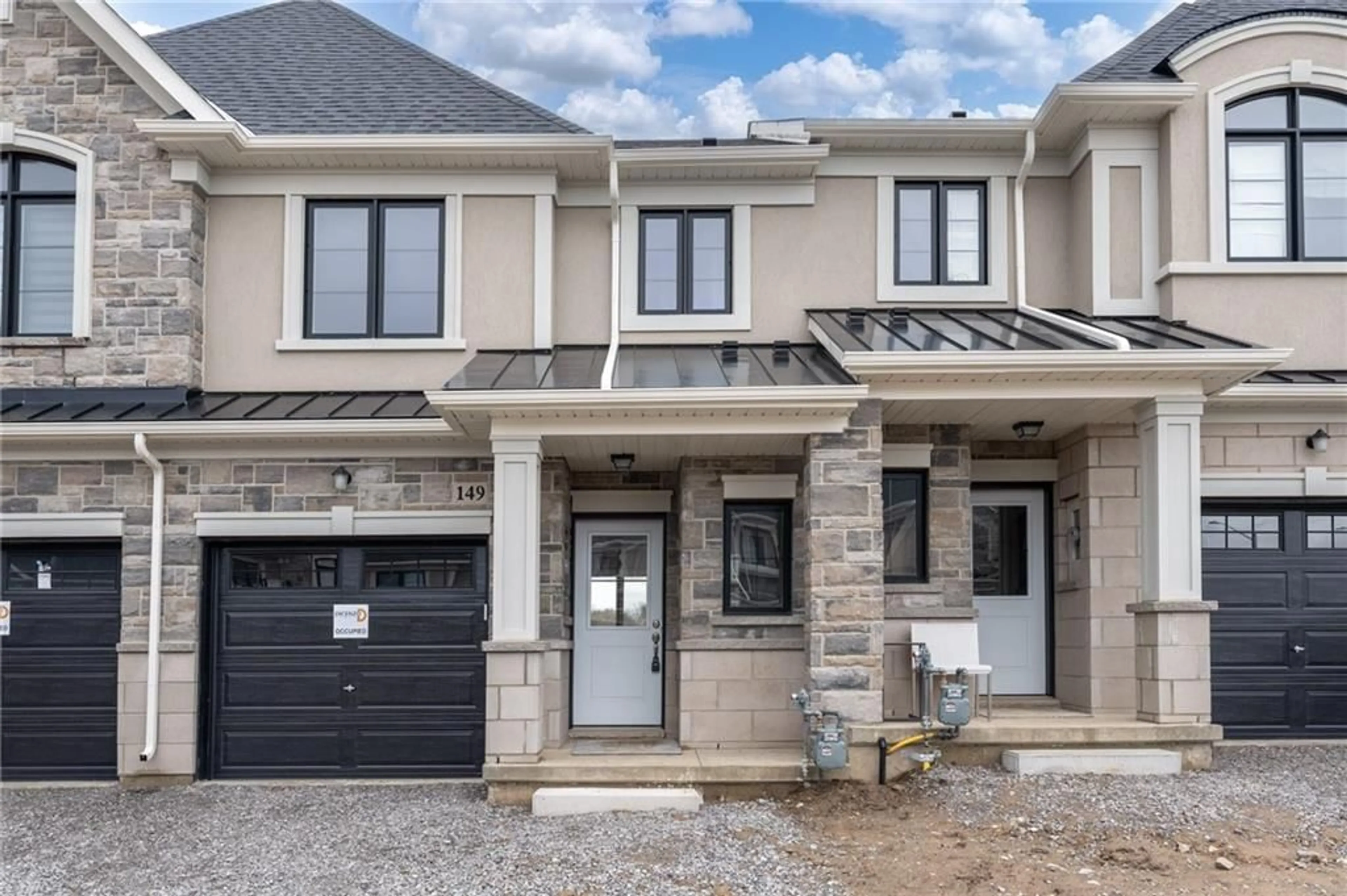Home with brick exterior material for 149 Aquasanta Cres, Hamilton Ontario L8K 1B2