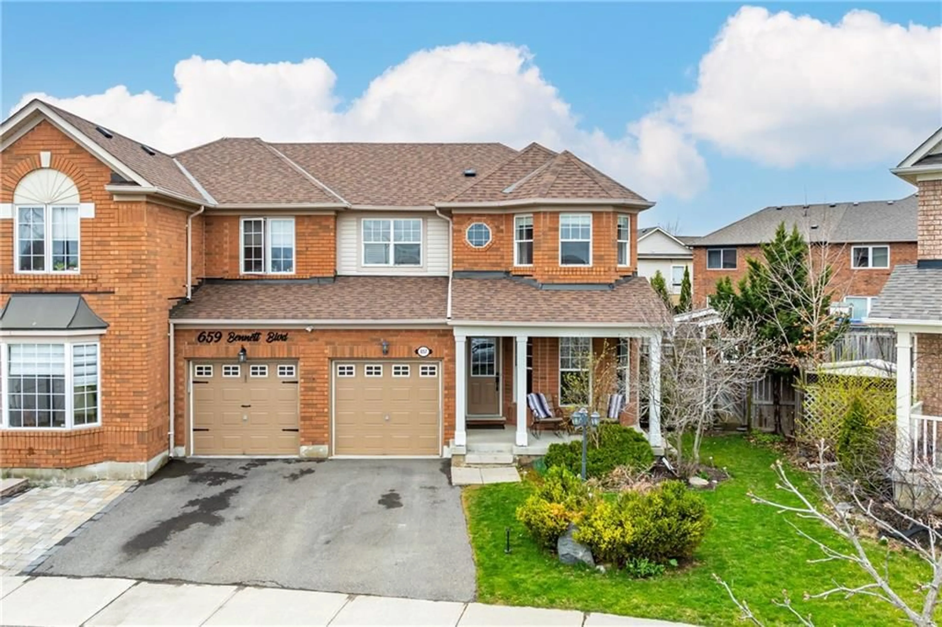 Frontside or backside of a home for 657 Bennett Blvd, Milton Ontario L9T 6A9