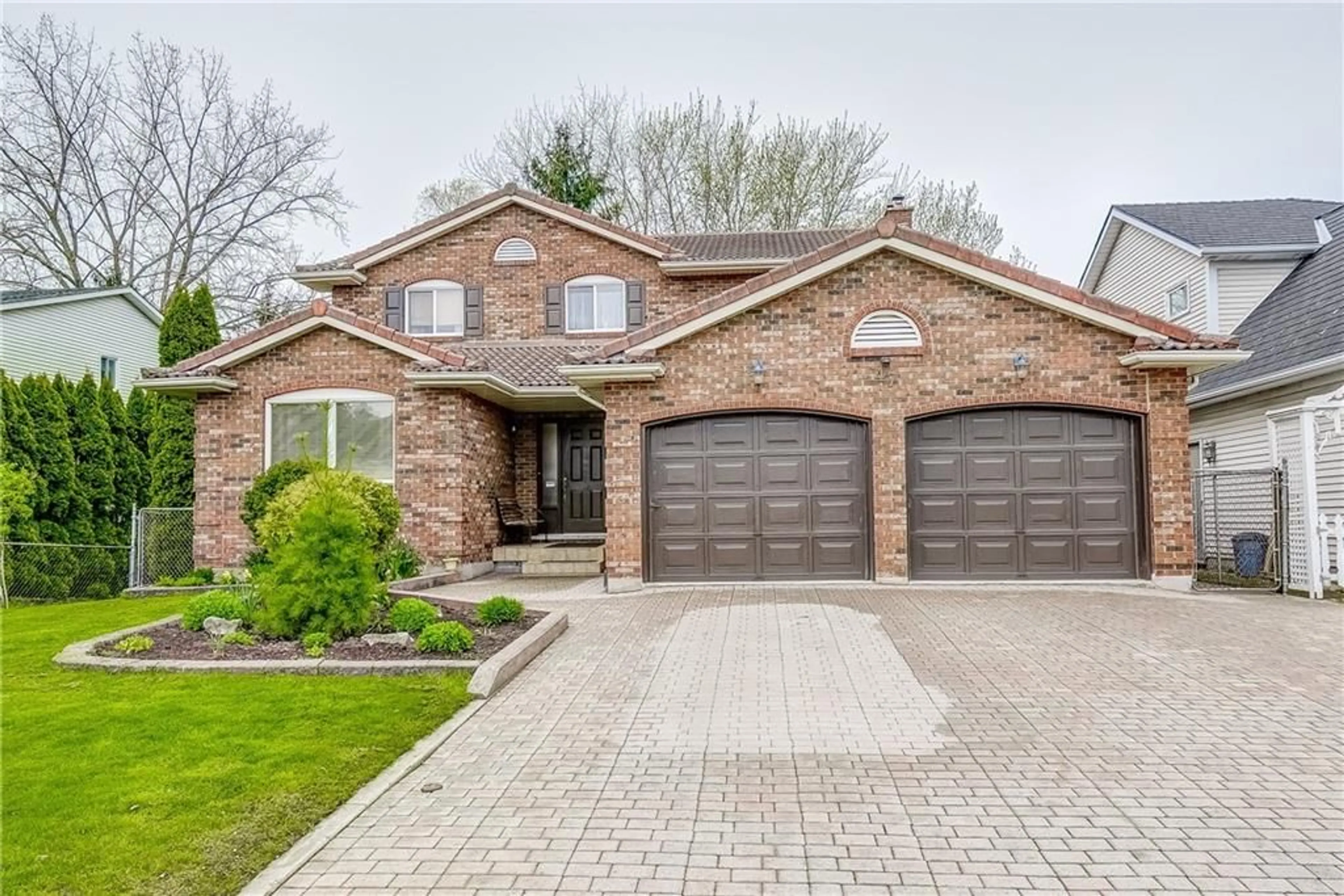 Home with brick exterior material for 47 CHANCERY Cir, St. Catharines Ontario L2M 7R3