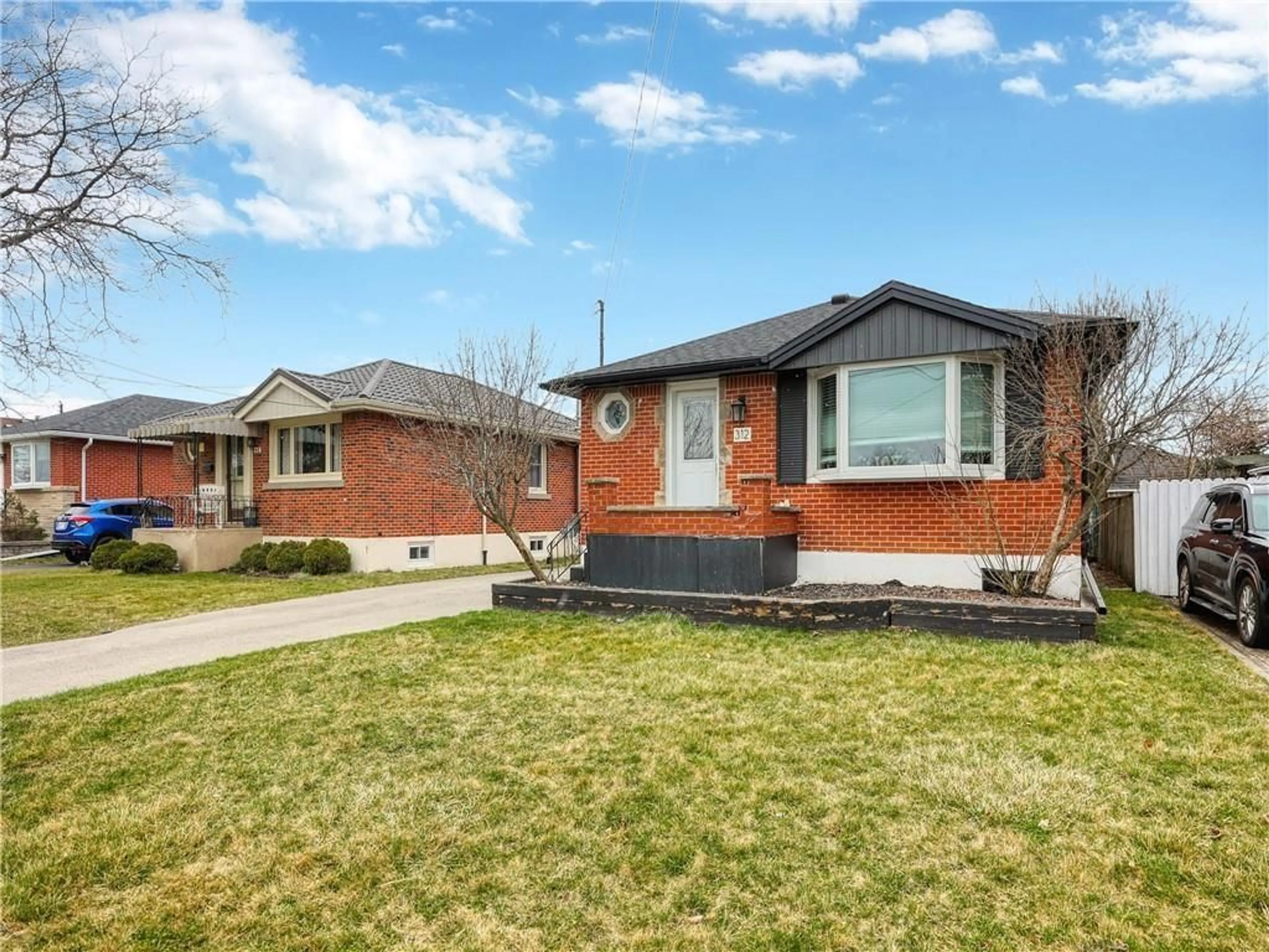 Frontside or backside of a home for 312 EAST 45TH St, Hamilton Ontario L8T 3K8