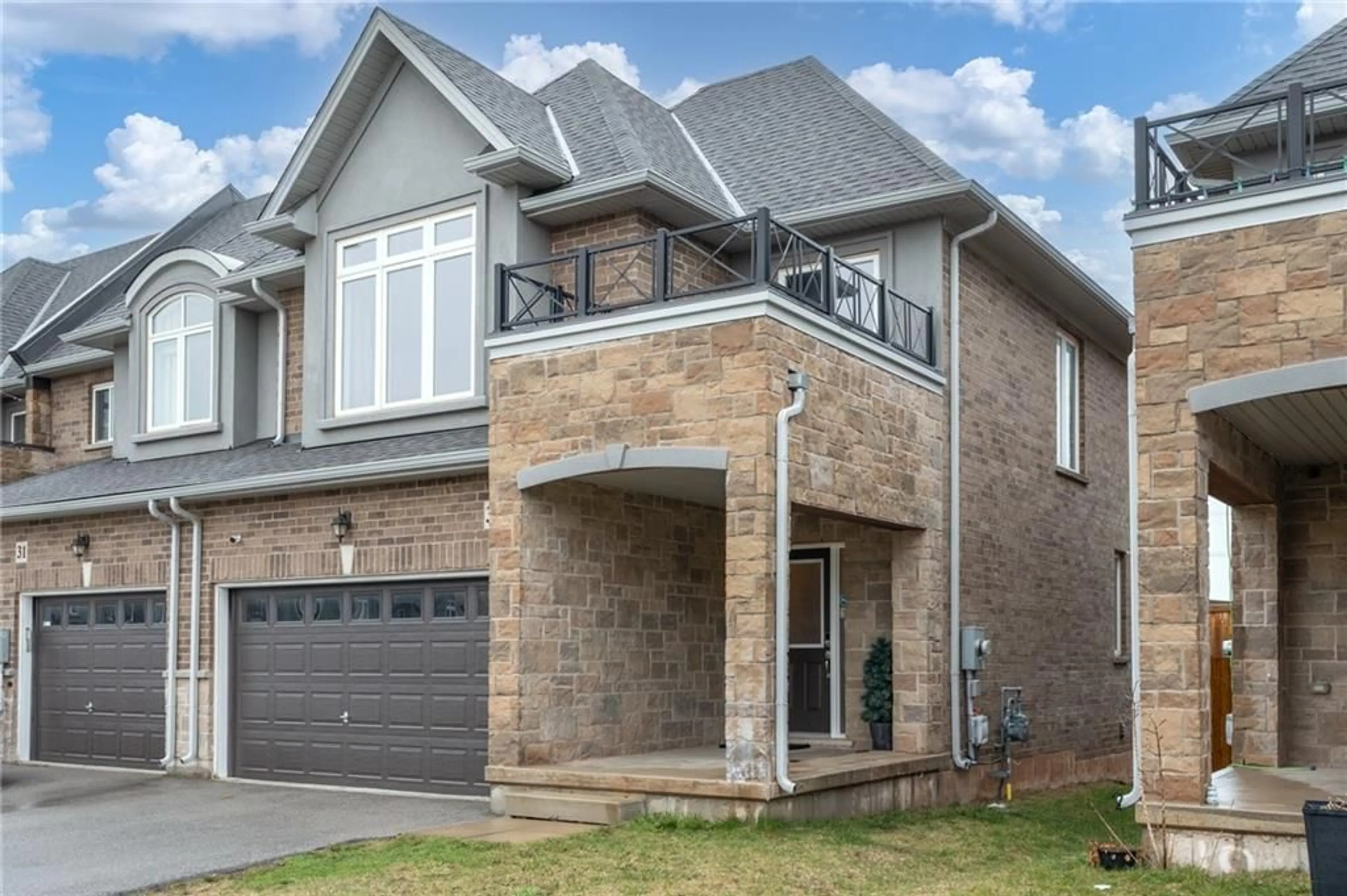 Home with brick exterior material for 33 PINOT Cres, Hamilton Ontario L8E 0J8