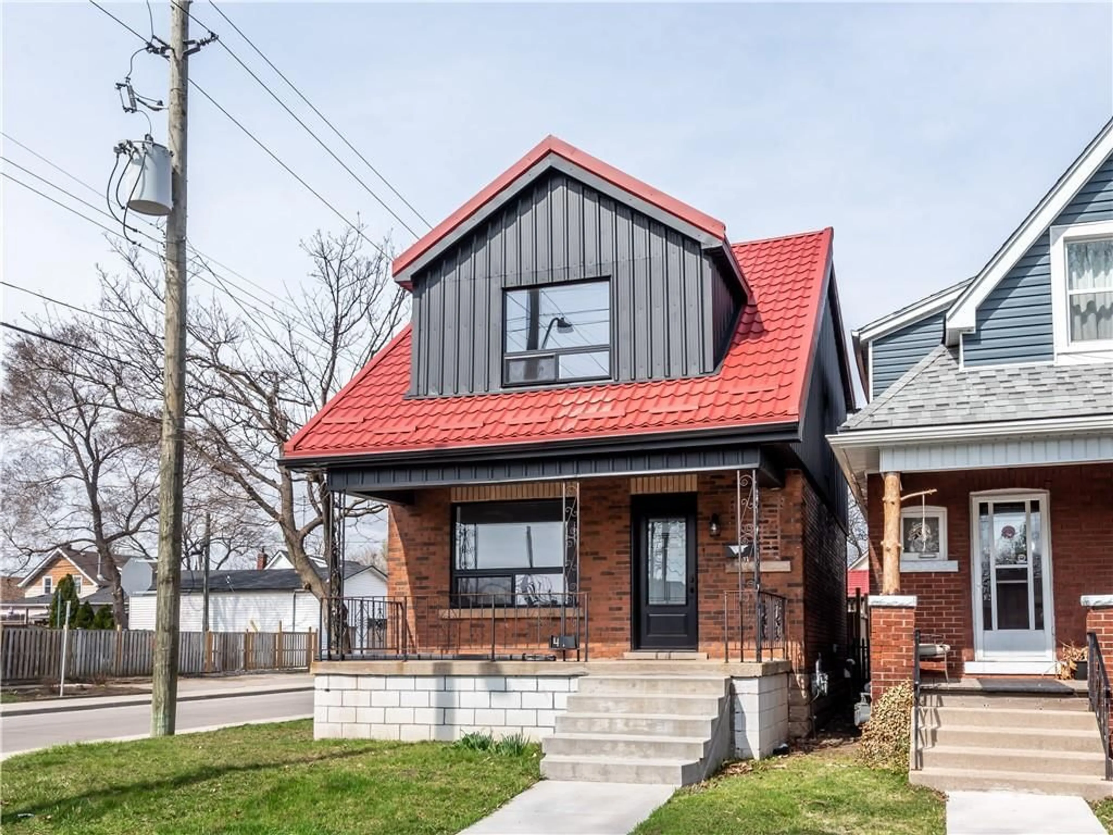 Home with brick exterior material for 49 CAMERON Ave, Hamilton Ontario L8H 4Z1