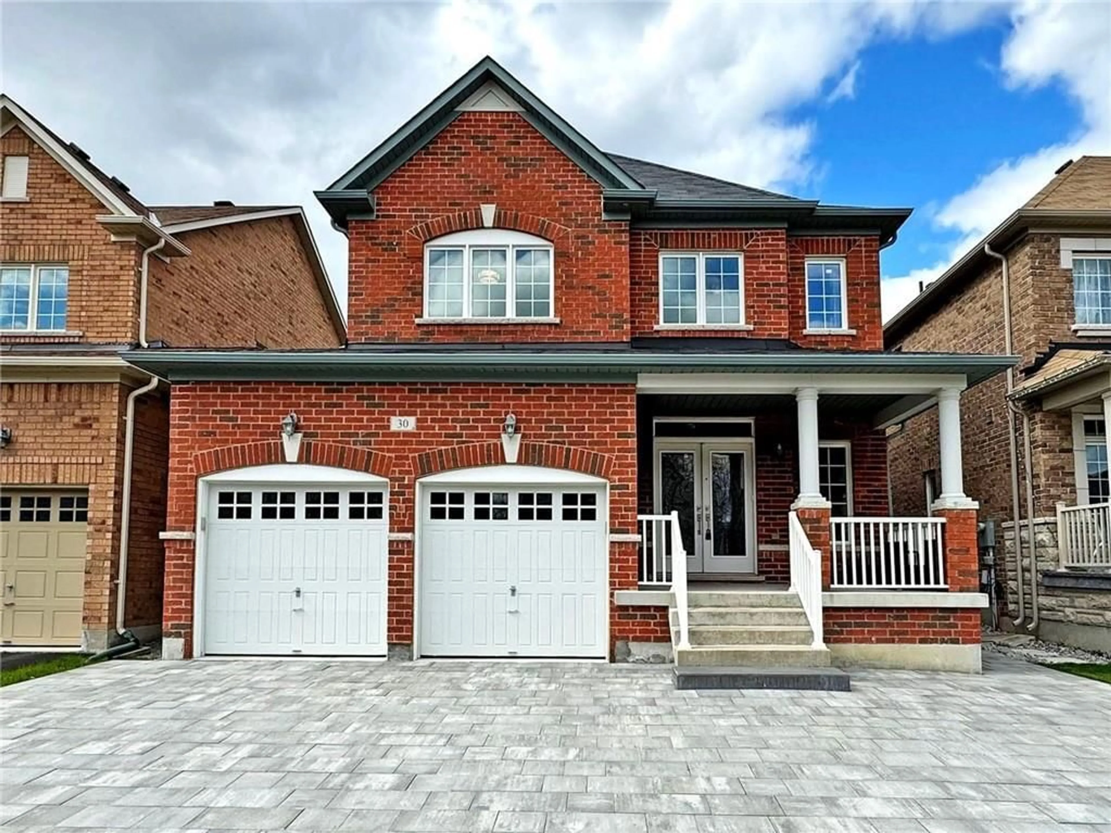 Home with brick exterior material for 30 Bush Ridges Ave, Jefferson Ontario L4E 0P1
