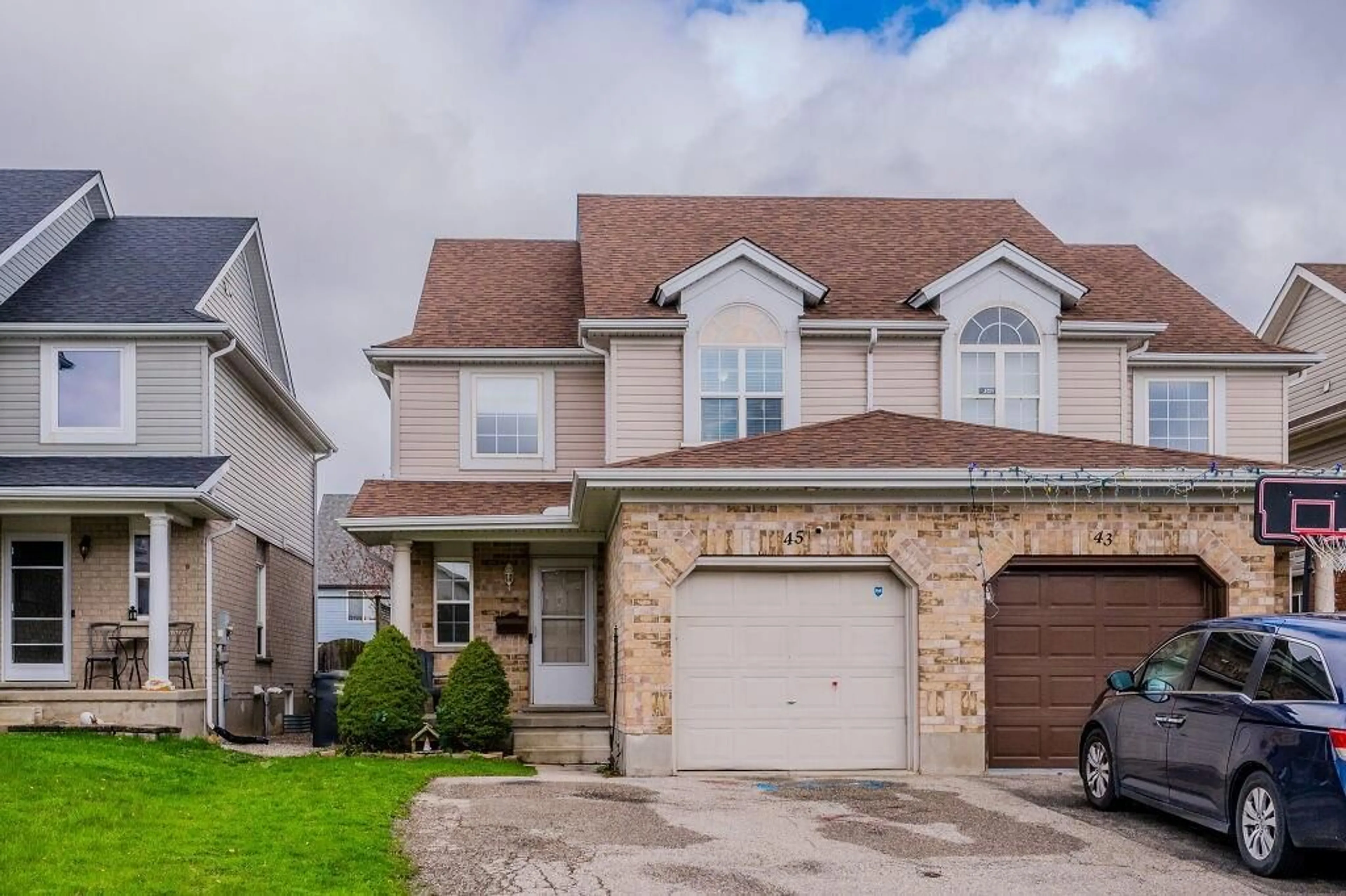 Frontside or backside of a home for 45 Swift Cres, Guelph Ontario N1E 7J3