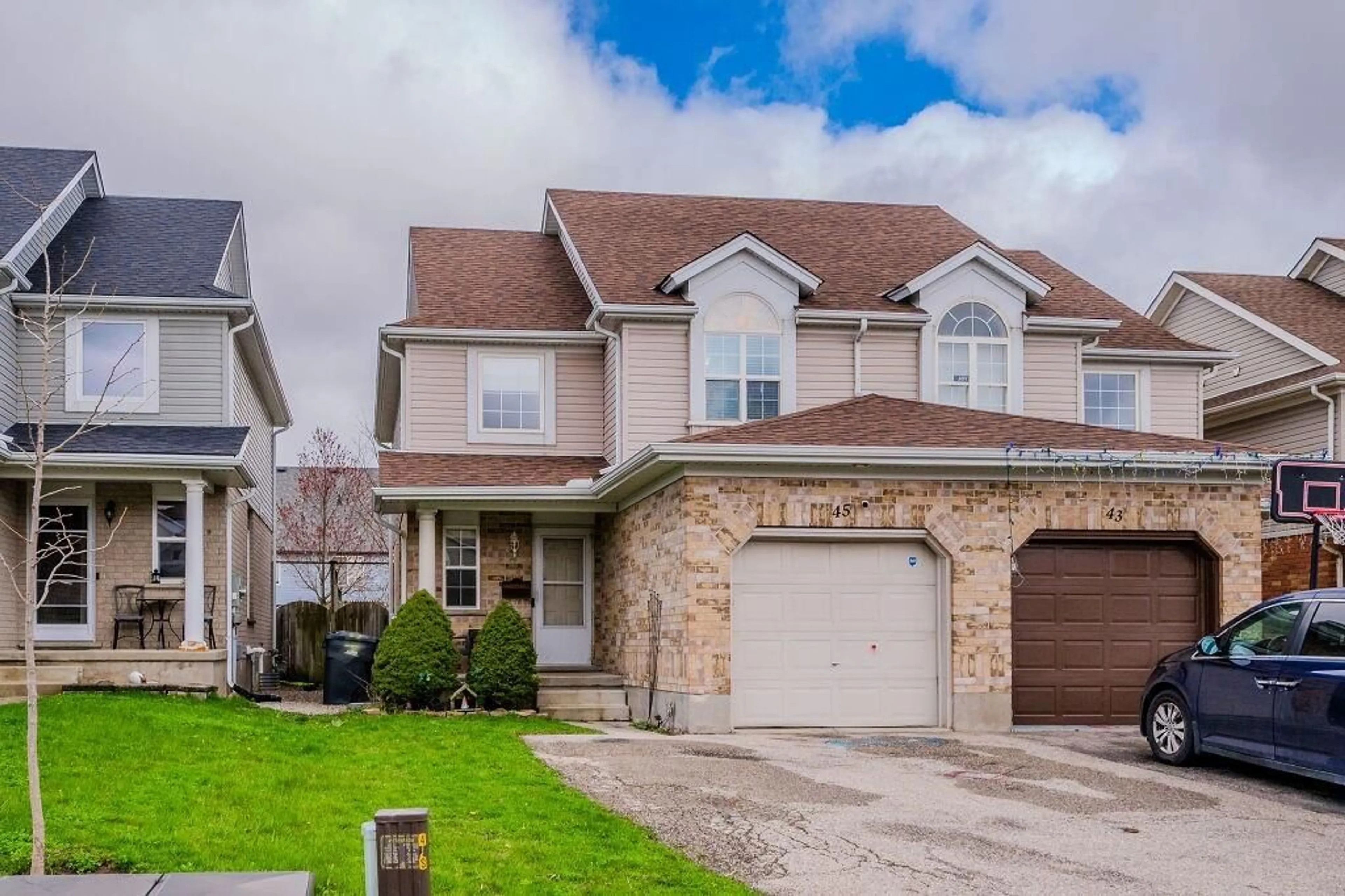 Frontside or backside of a home for 45 Swift Cres, Guelph Ontario N1E 7J3