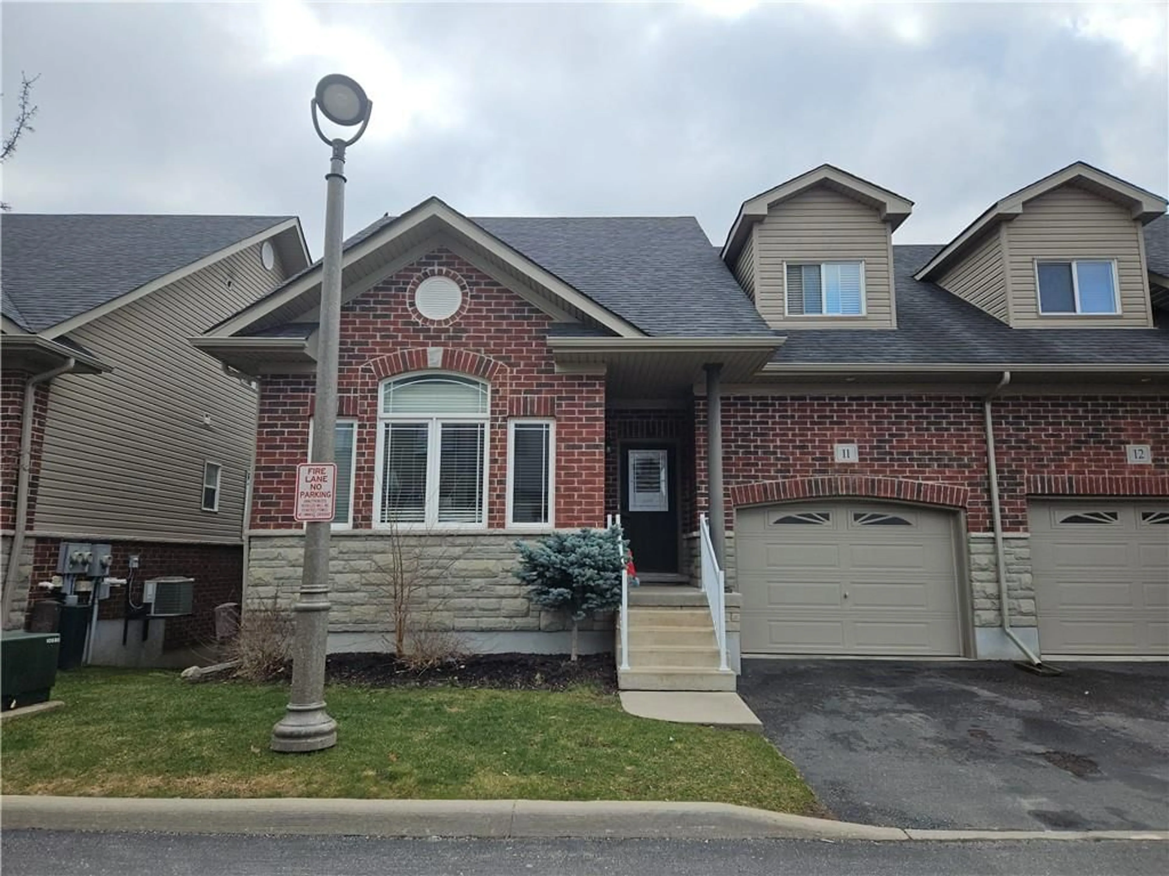 Frontside or backside of a home for 695 MYERS Rd #11, Cambridge Ontario N1P 0A6