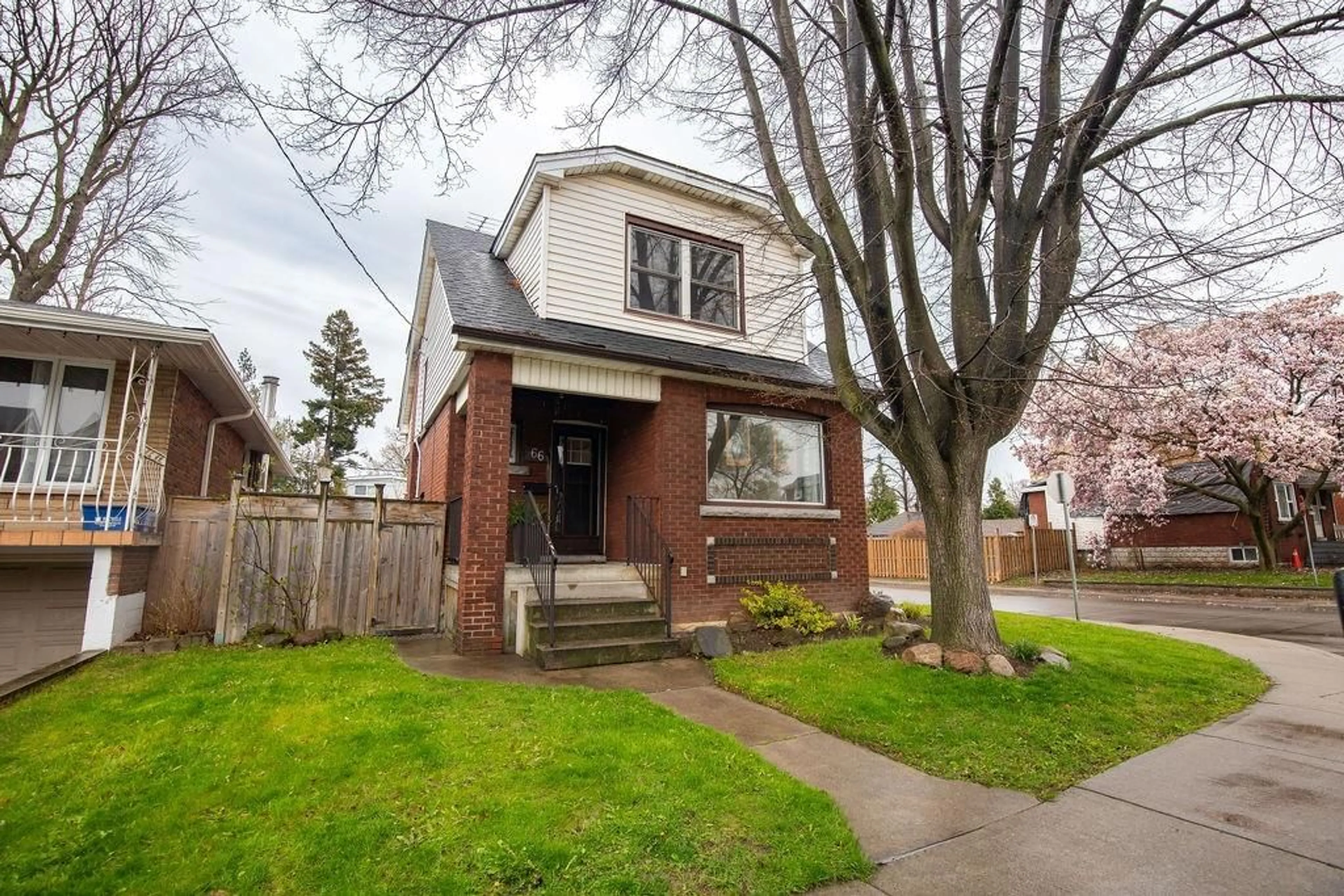 Home with brick exterior material for 66 Cameron Ave, Hamilton Ontario L8H 4Z2