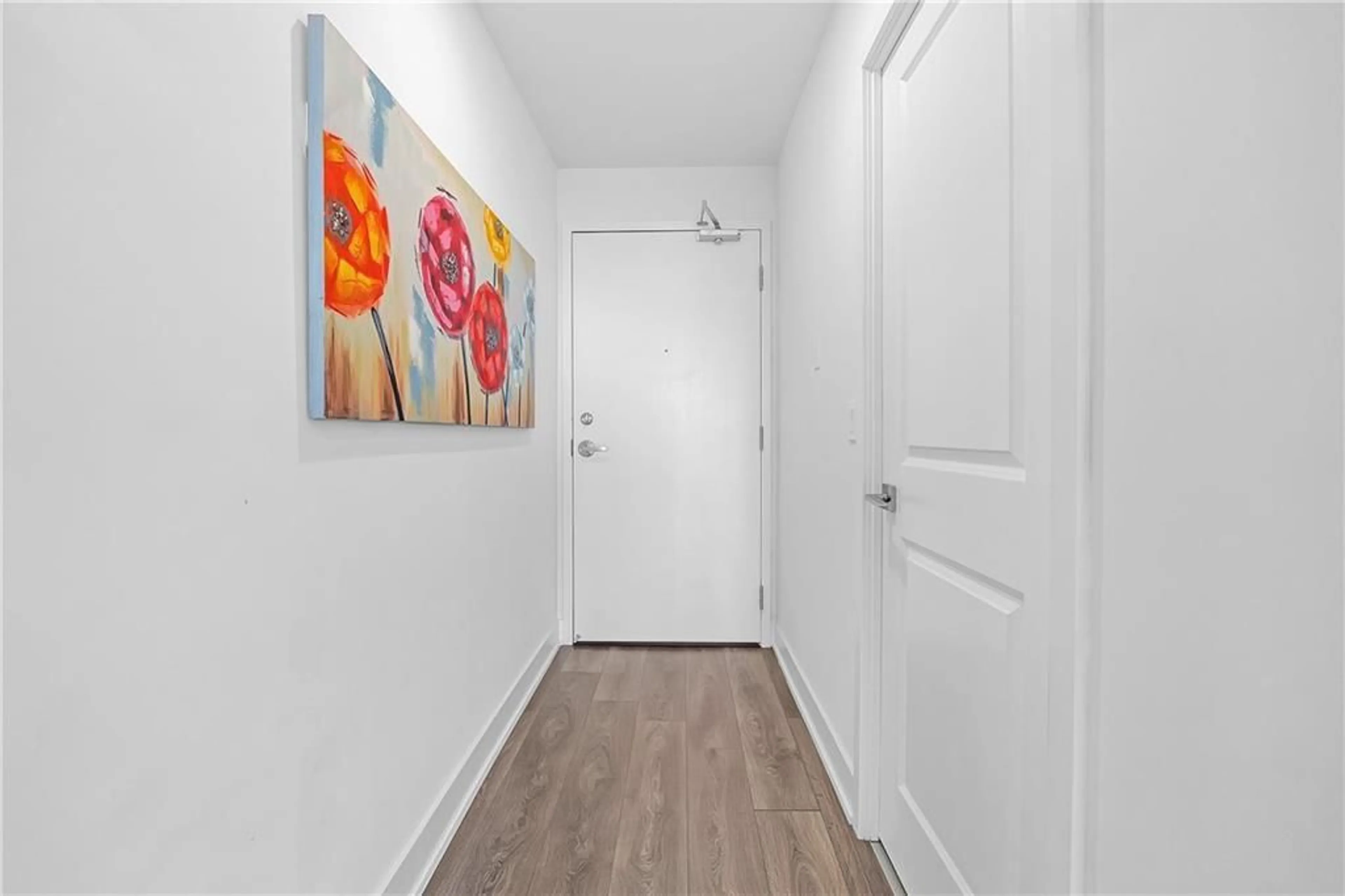 Indoor entryway, wood floors for 297 OAK WALK Dr #1106, Oakville Ontario L6H 3R6