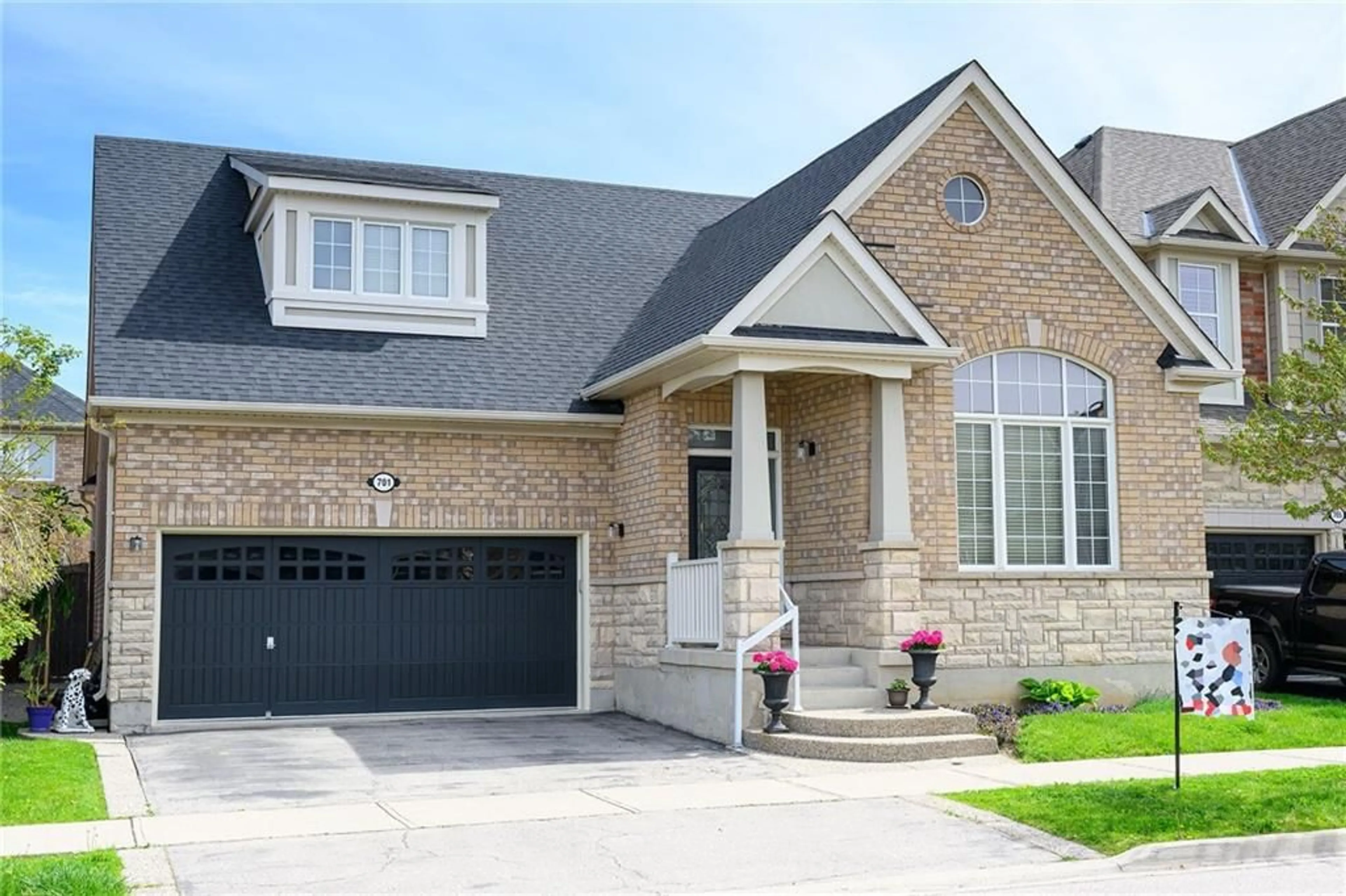 Home with brick exterior material for 701 SAVOLINE Blvd, Milton Ontario L9T 0N2