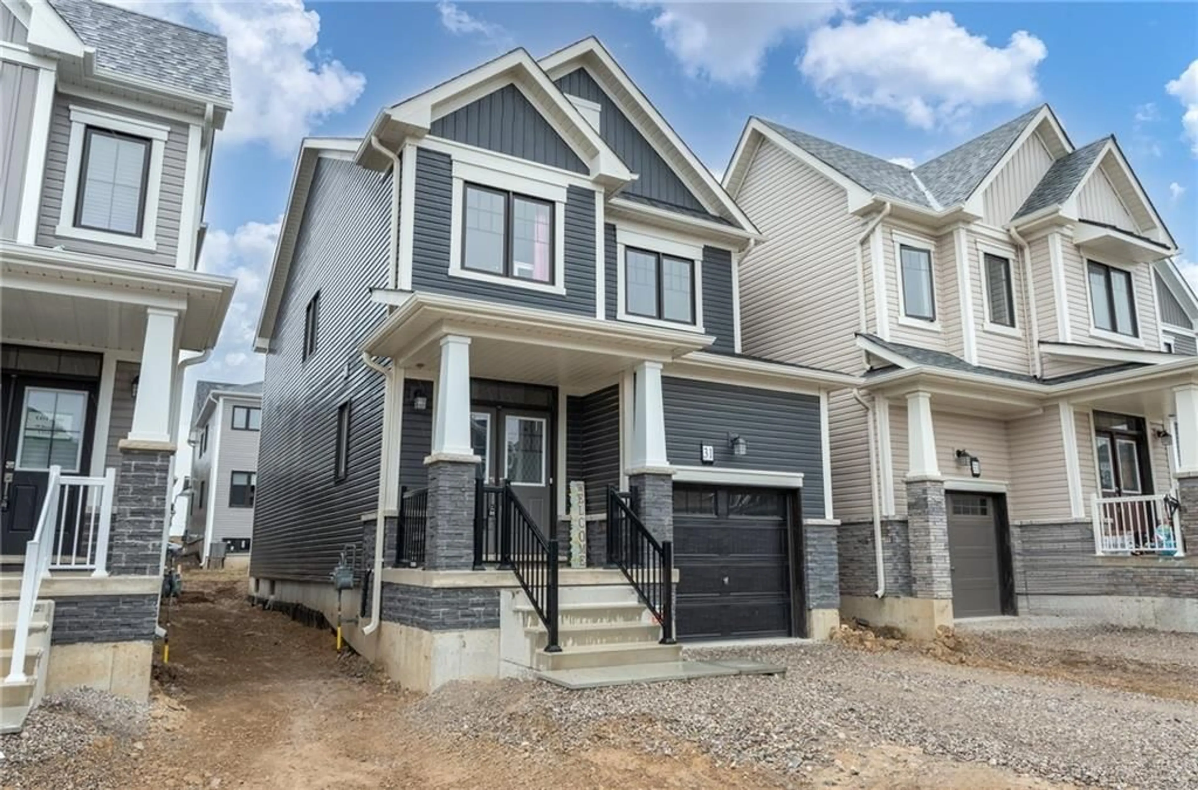 Frontside or backside of a home for 31 BASSWOOD Cres, Caledonia Ontario N3W 0H5