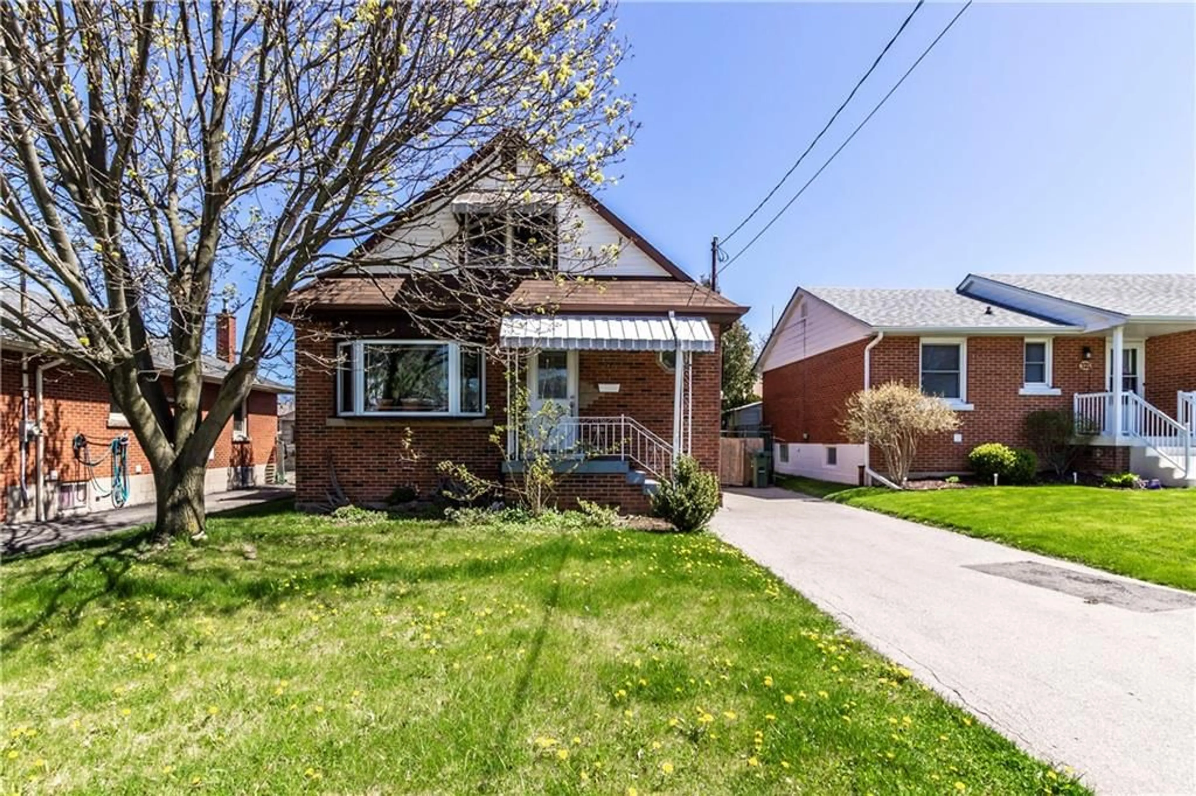 Frontside or backside of a home for 317 EAST 15TH St, Hamilton Ontario L9A 4G6