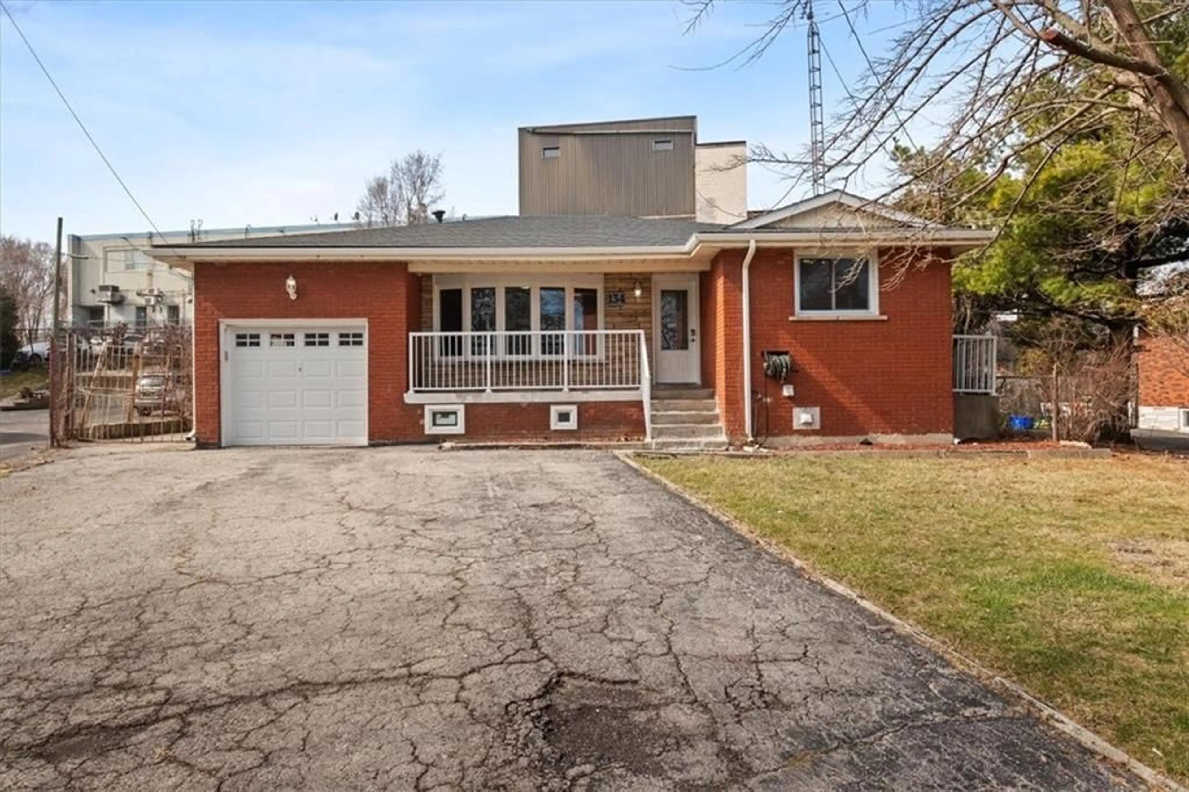 Home with brick exterior material for 134 Victor Blvd, Hamilton Ontario L9A 2V4