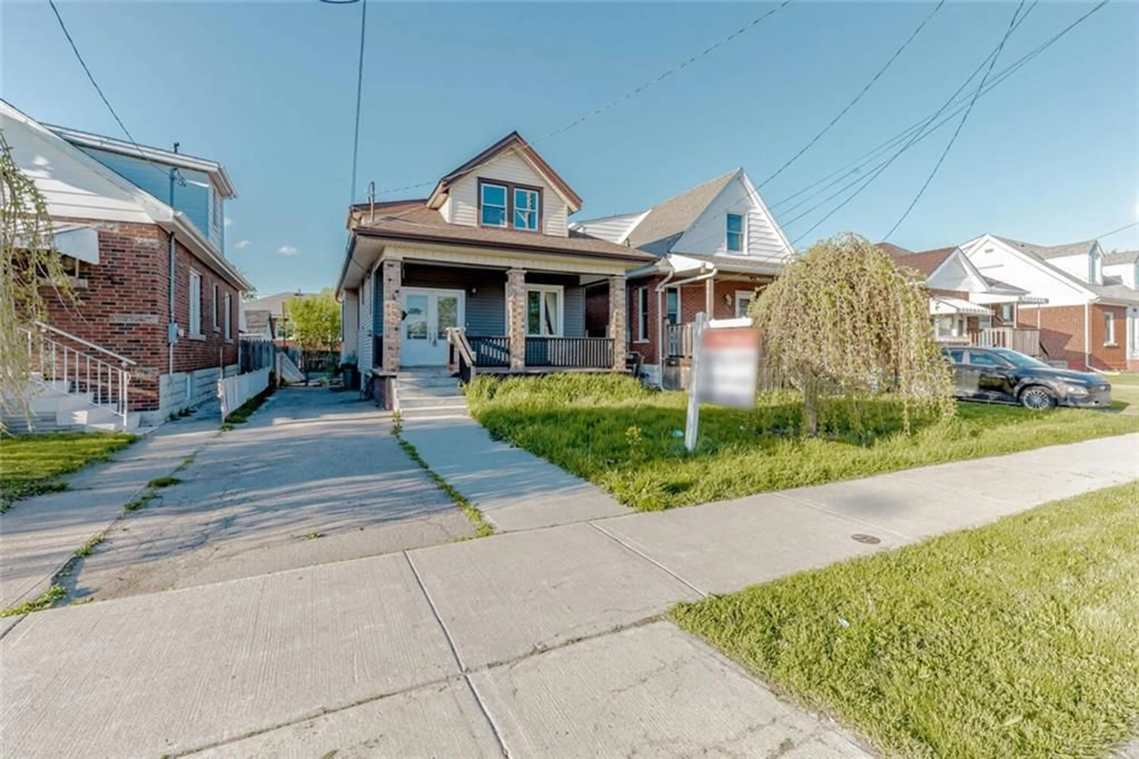 Frontside or backside of a home for 1663 Main St, Hamilton Ontario L8H 1C8