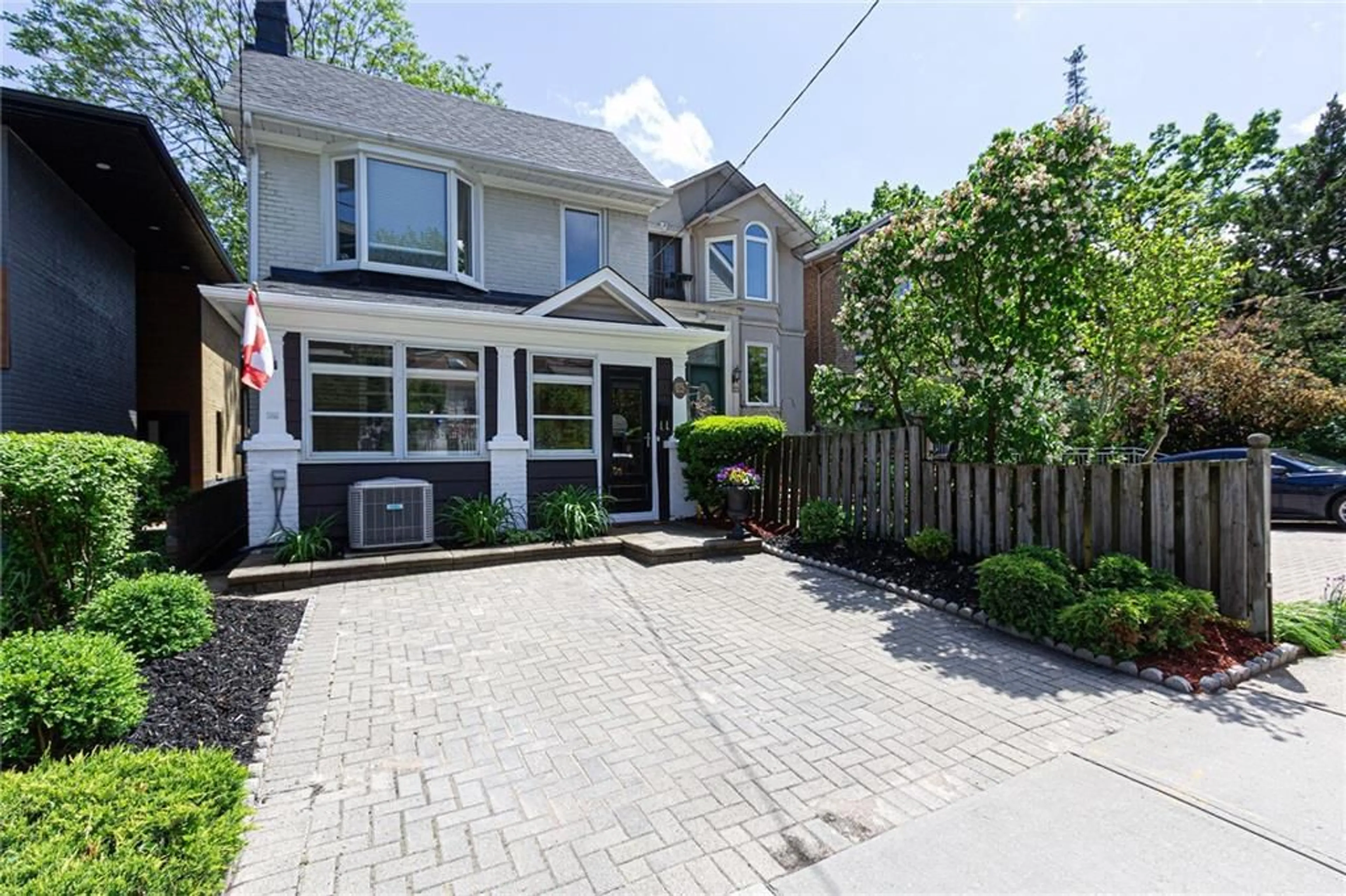 A pic from exterior of the house or condo for 125 Duvernet Ave, Toronto Ontario M4E 1V5