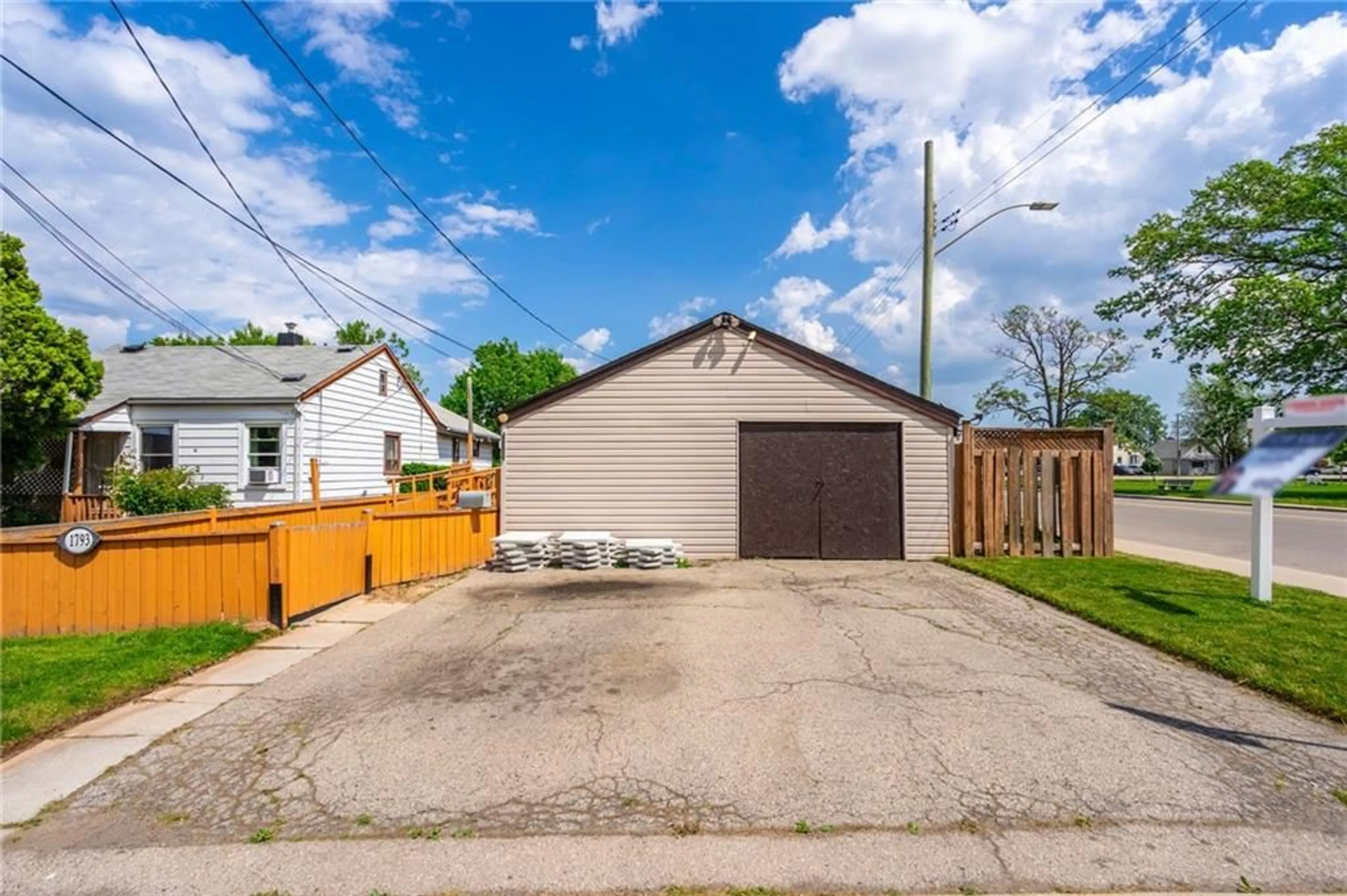 Frontside or backside of a home for 1793 Main St, Hamilton Ontario L8H 1E5