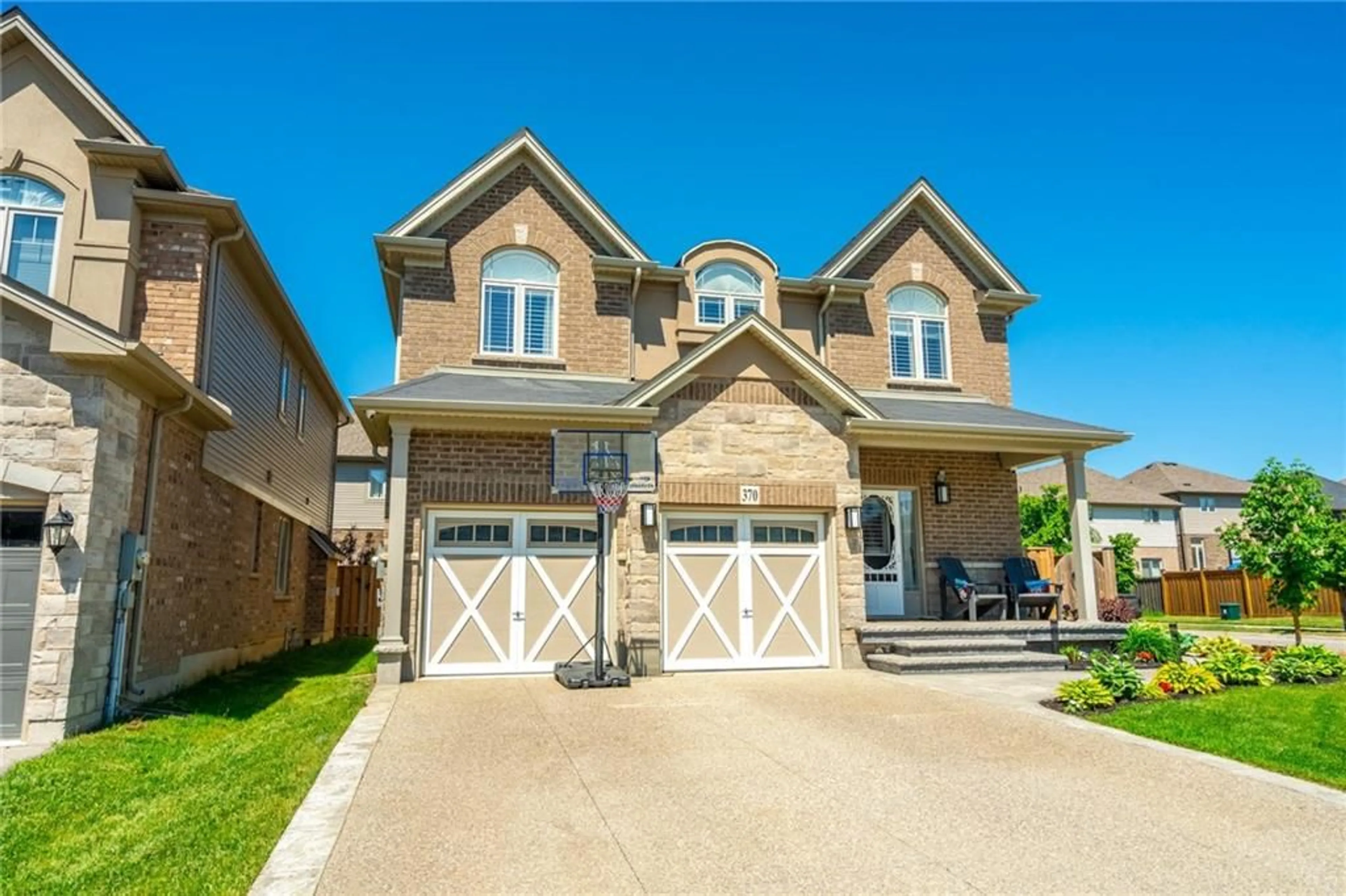 Frontside or backside of a home for 370 FESTIVAL Way, Binbrook Ontario L0R 1C0