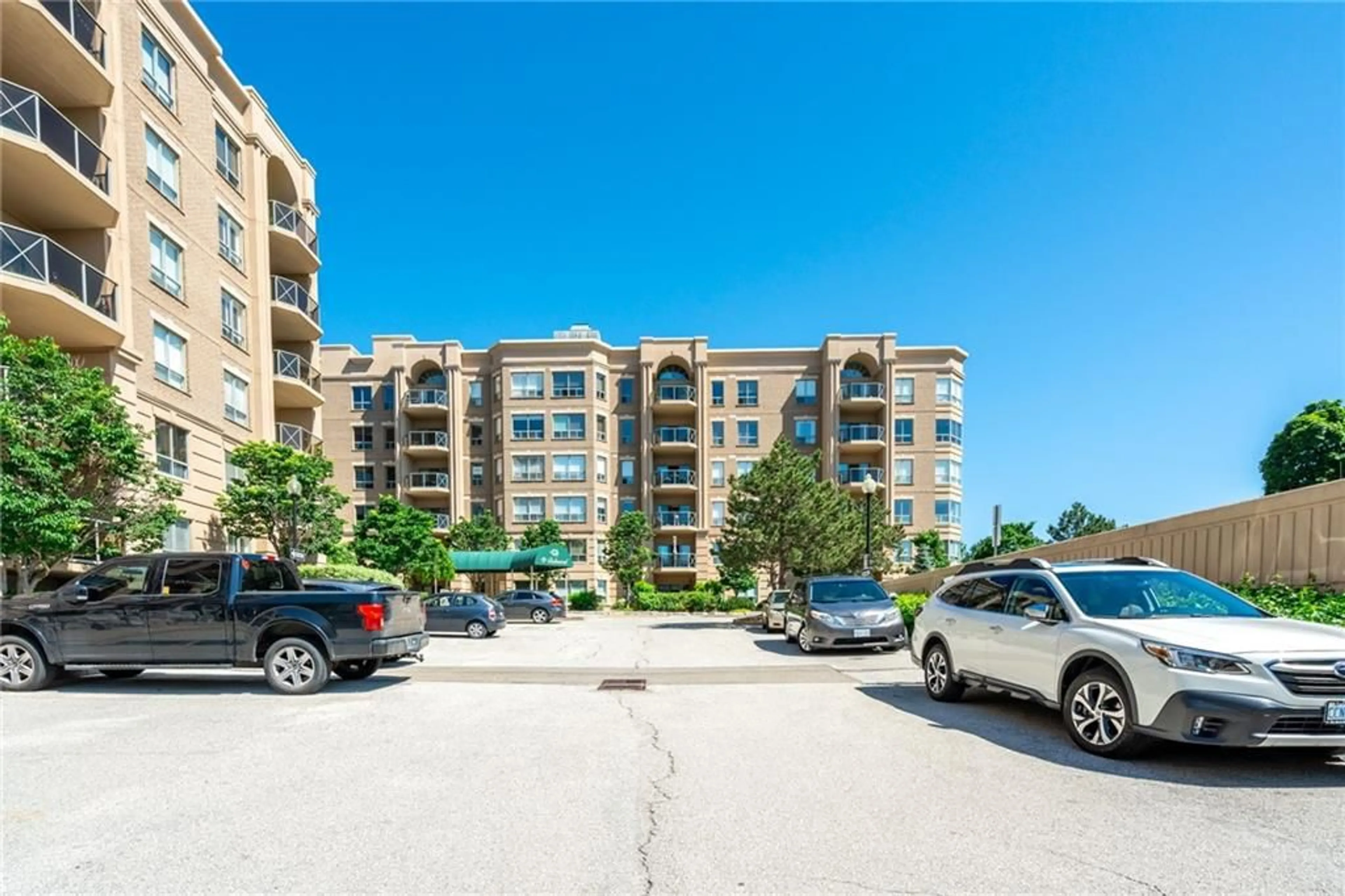 A pic from exterior of the house or condo, the street view for 2075 AMHERST HEIGHTS Dr #208, Burlington Ontario L7P 5B8