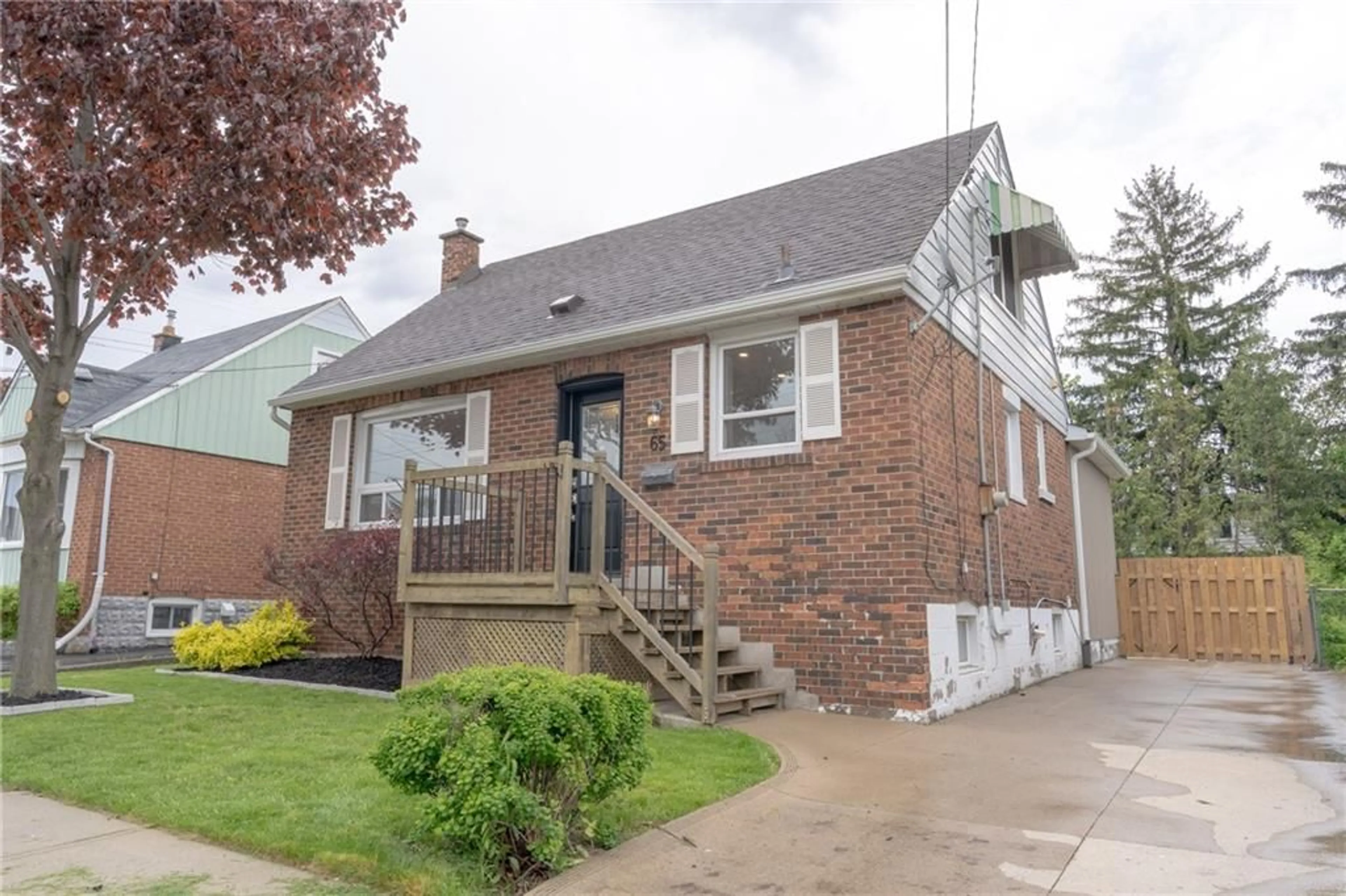 Frontside or backside of a home for 65 EAST 14th St, Hamilton Ontario L9A 4B4