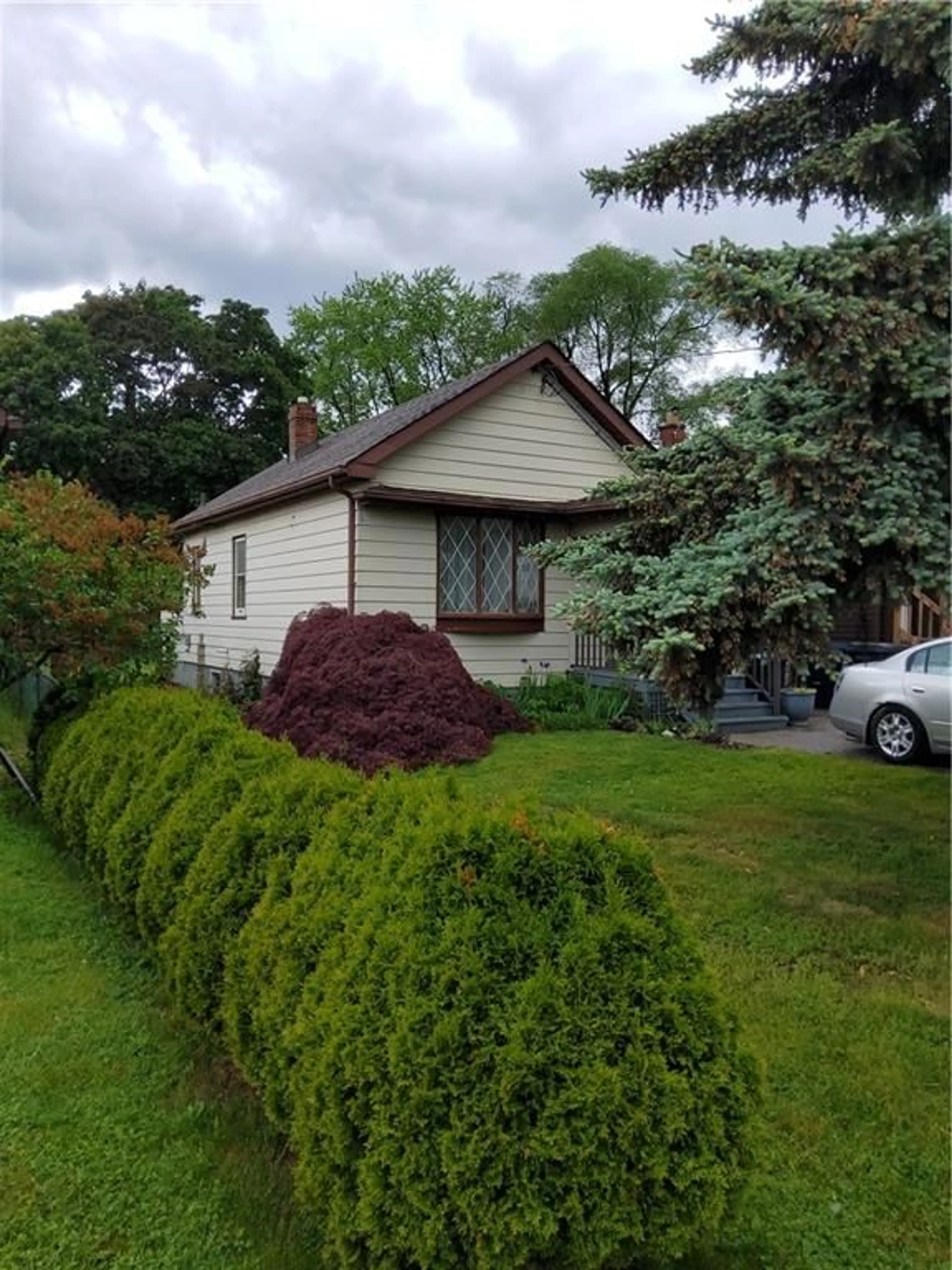 Frontside or backside of a home for 10 Phlox Ave, Etobicoke Ontario M8W 3A2