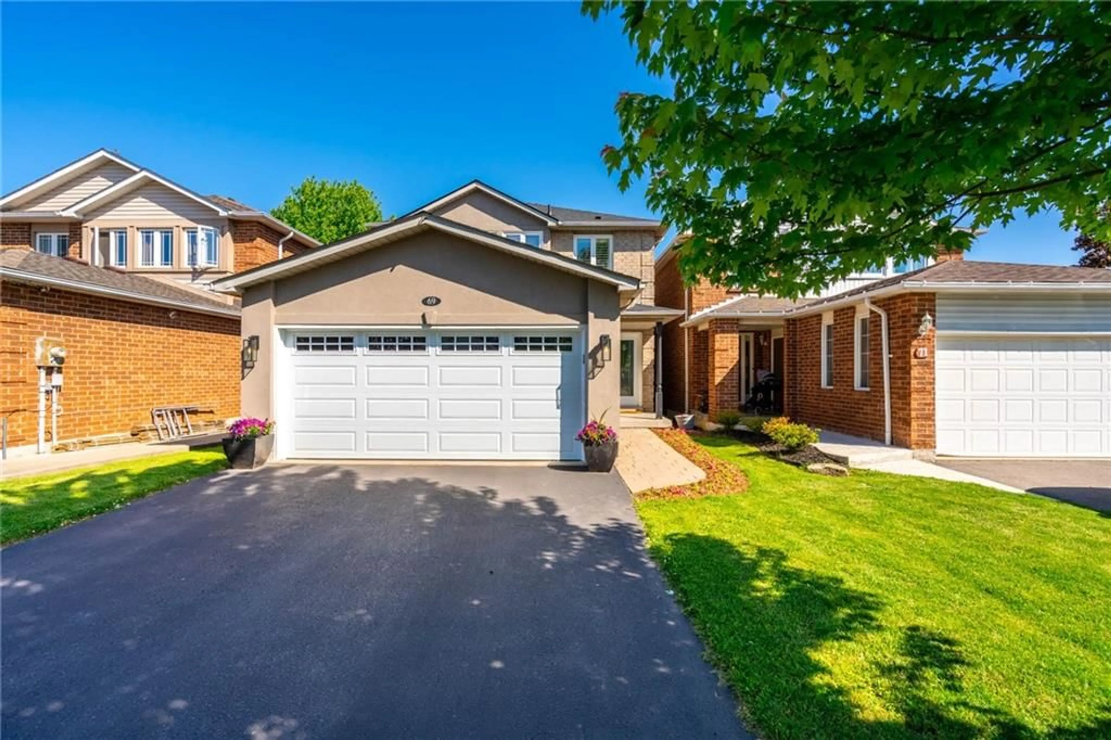 Frontside or backside of a home for 69 Grindstone Way, Waterdown Ontario L9H 7B5