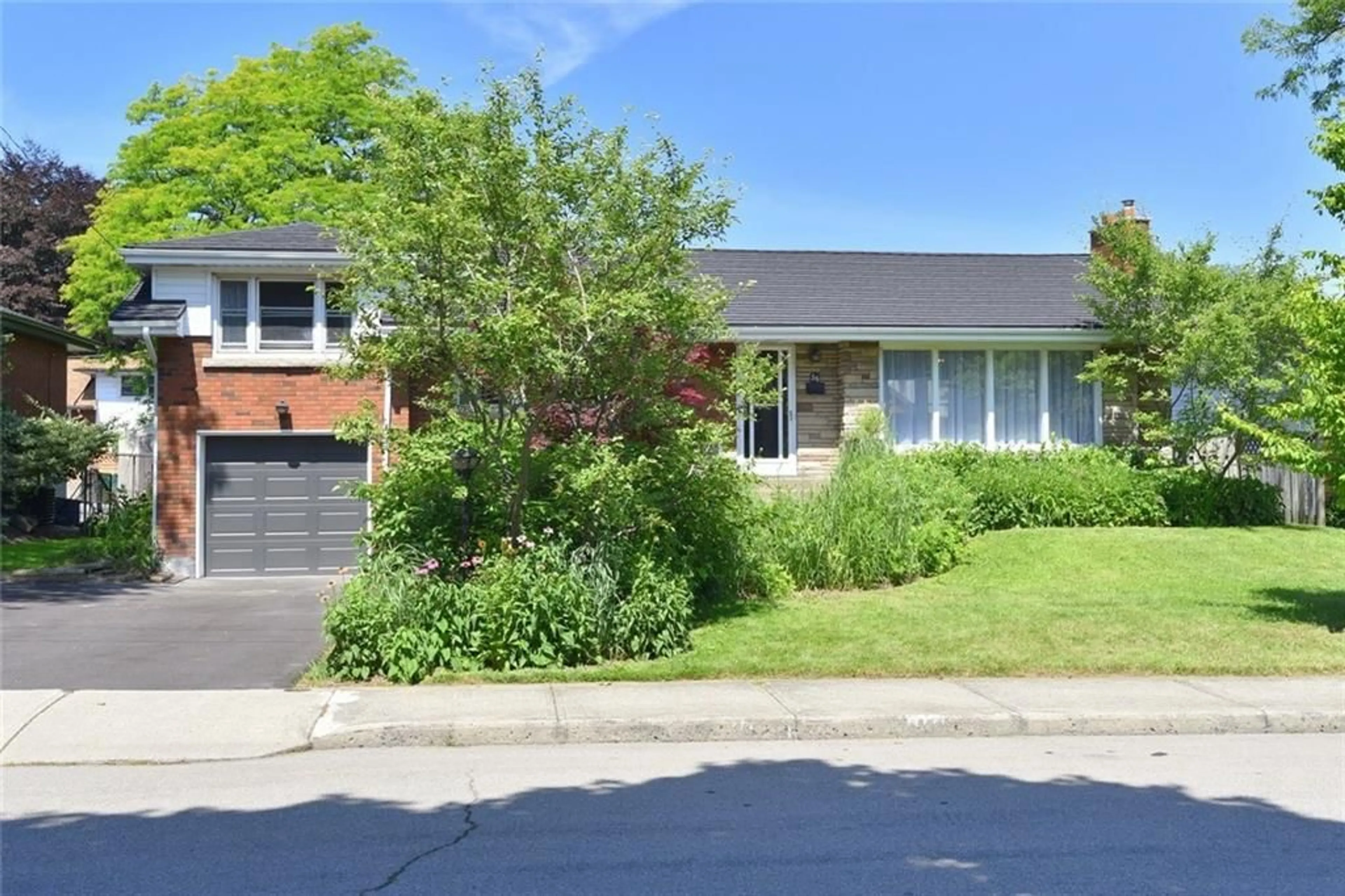 Frontside or backside of a home for 56 Westminster Ave, Hamilton Ontario L9C 4L9