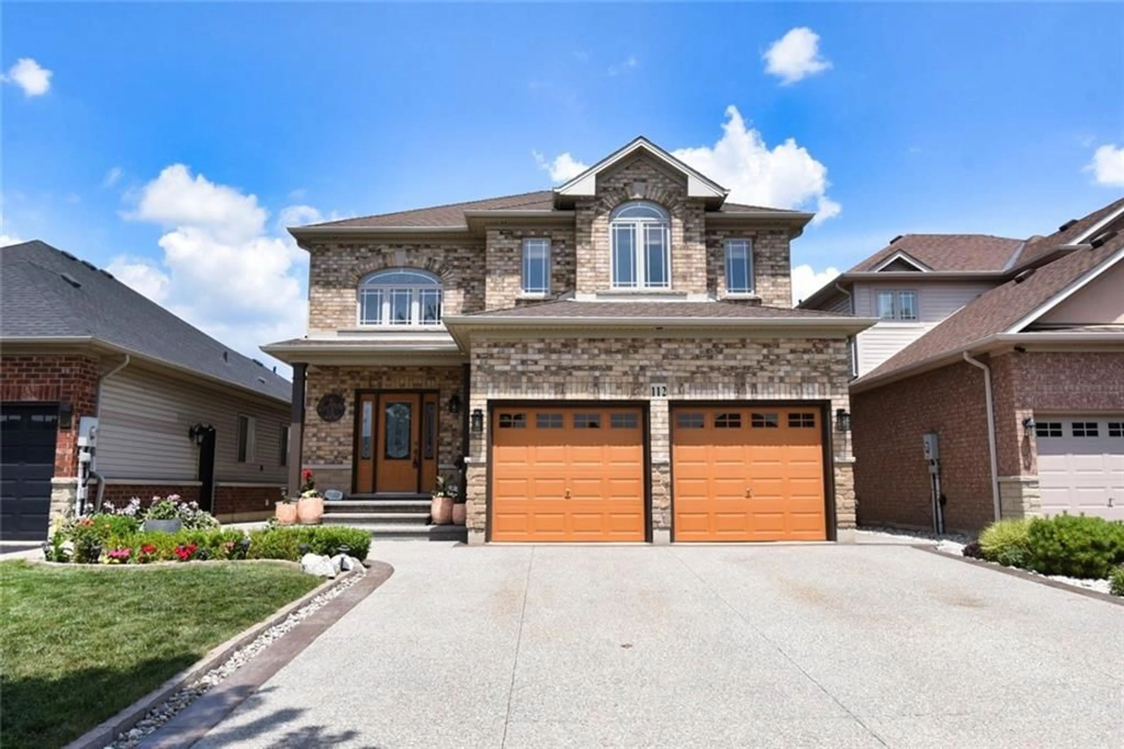 Home with brick exterior material for 112 Windwood Dr, Binbrook Ontario L0R 1C0