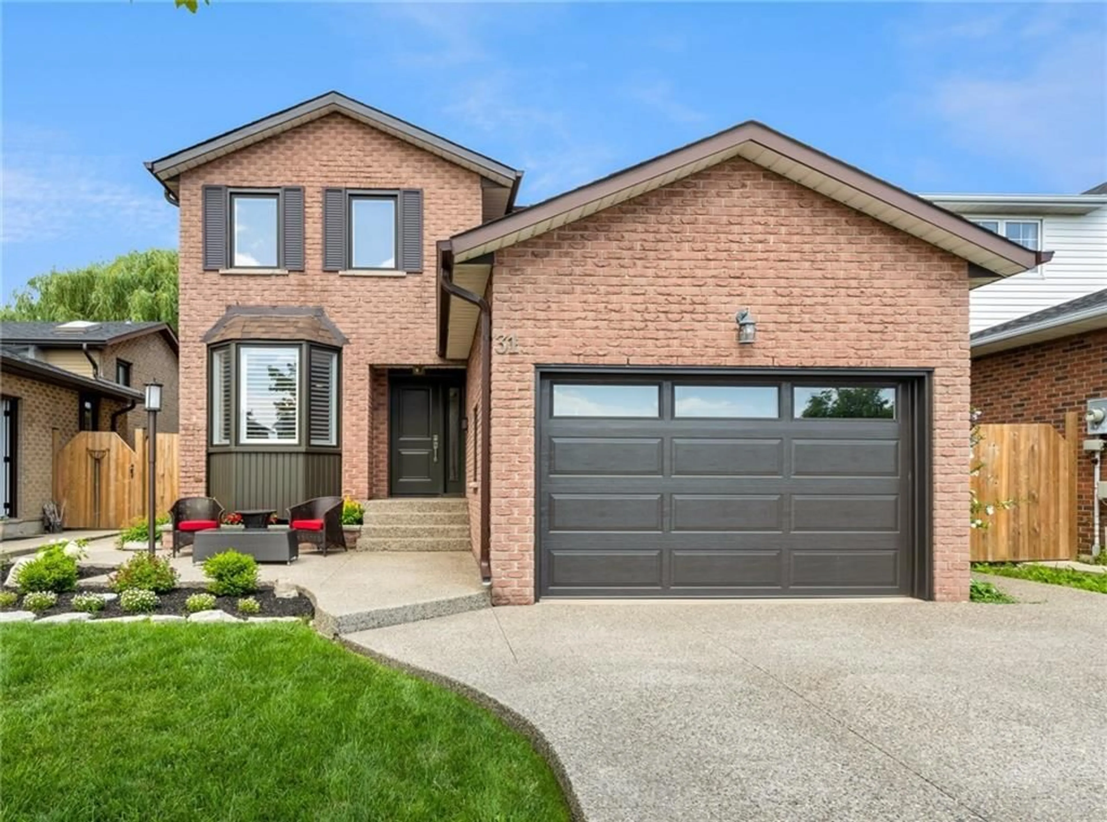 Home with brick exterior material for 31 Trenholme Cres, Hamilton Ontario L8W 2L4