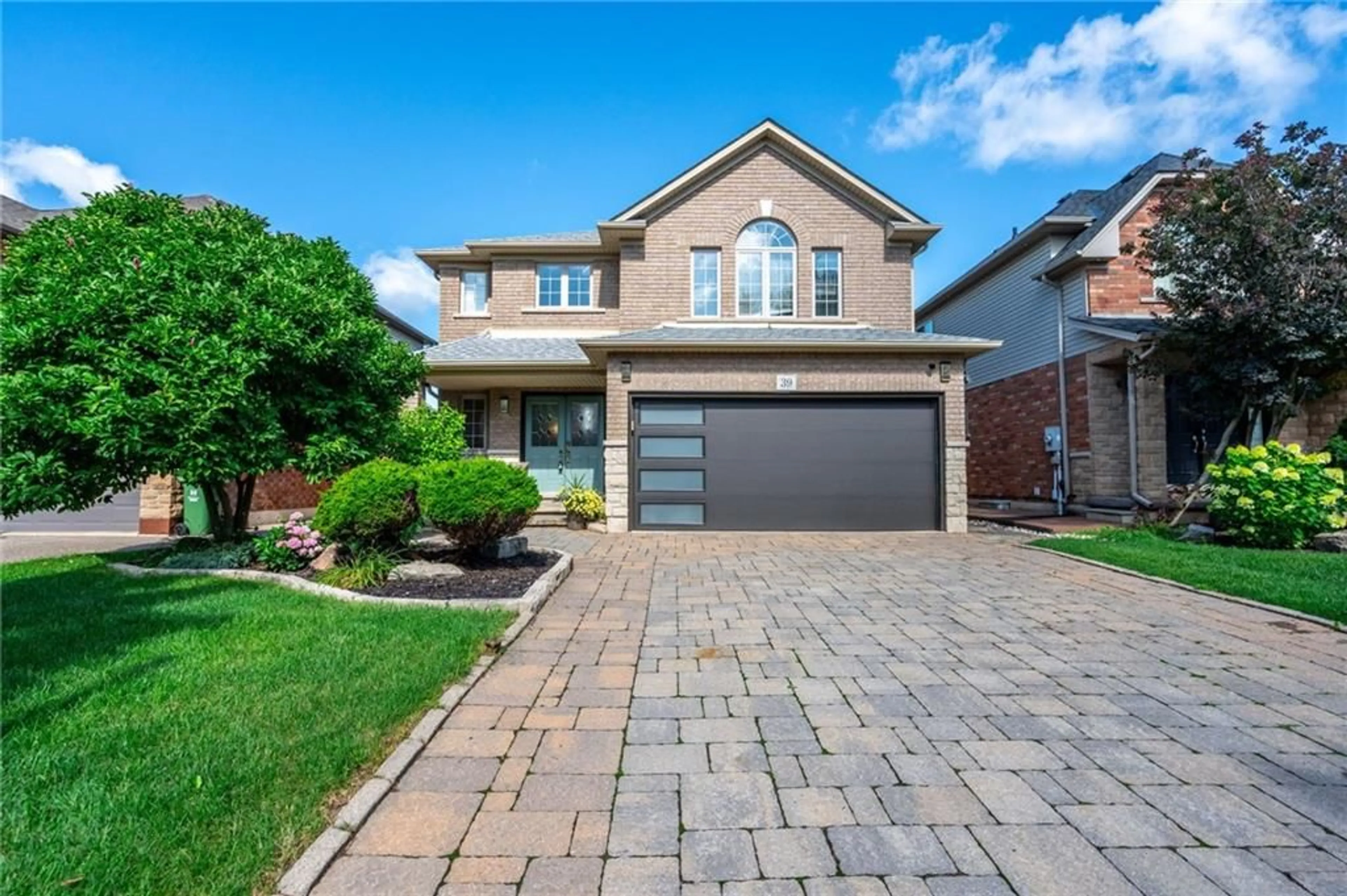 Home with brick exterior material for 39 Wilbur Dr, Binbrook Ontario L0R 1C0